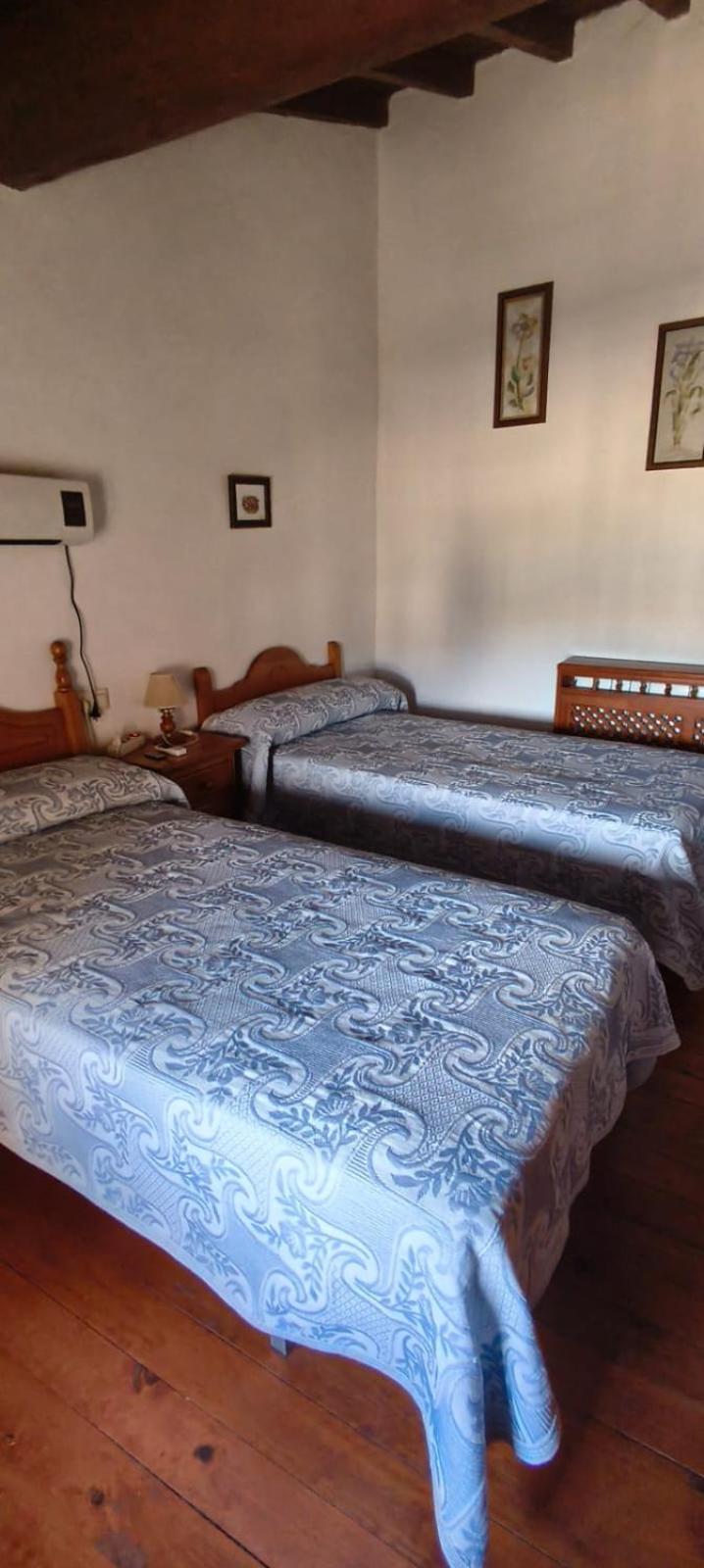 Habitación Doble con Dos Camas Dobles