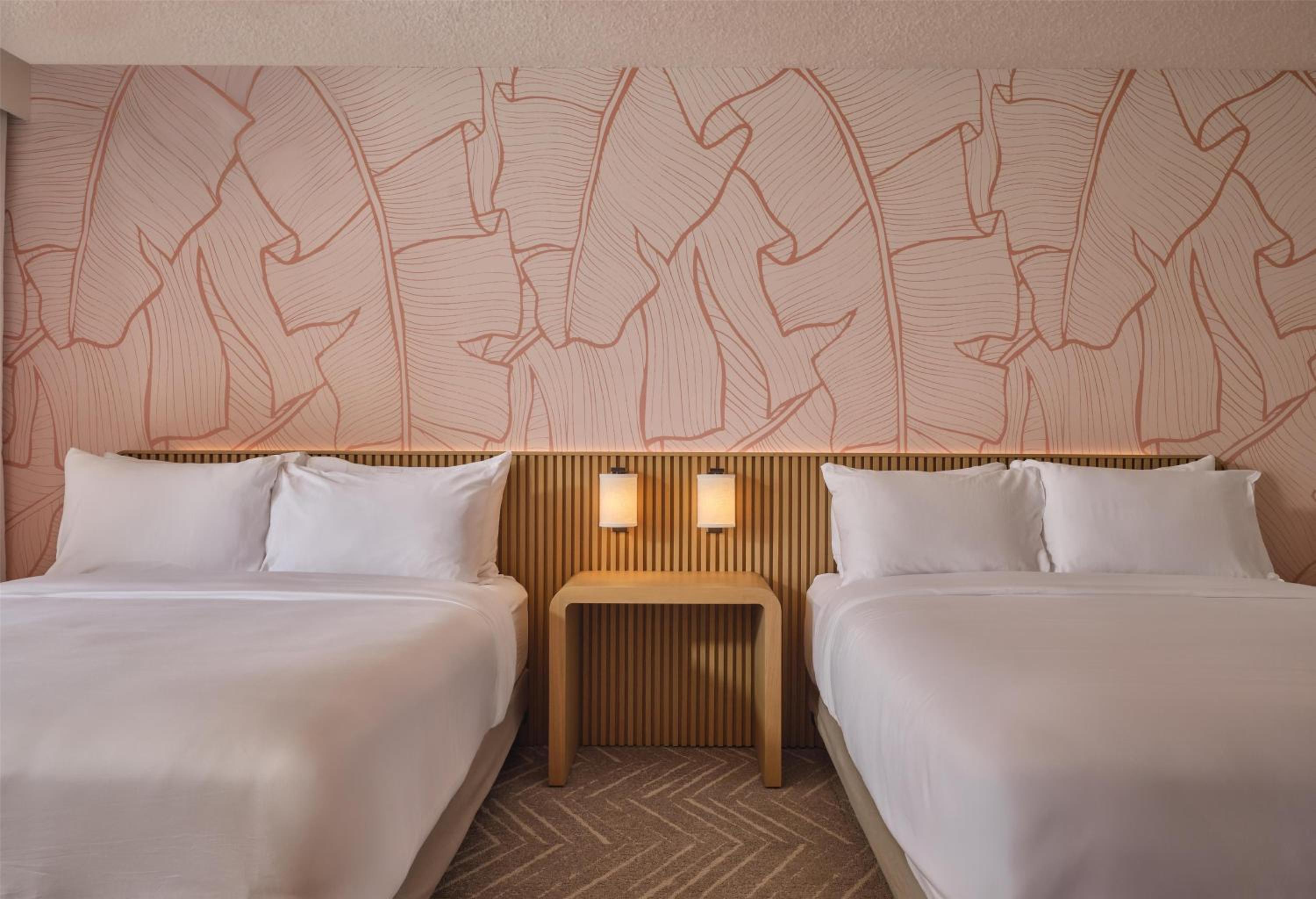 Queen Room with Two Queen Beds and Partial Ocean View - Photo 1