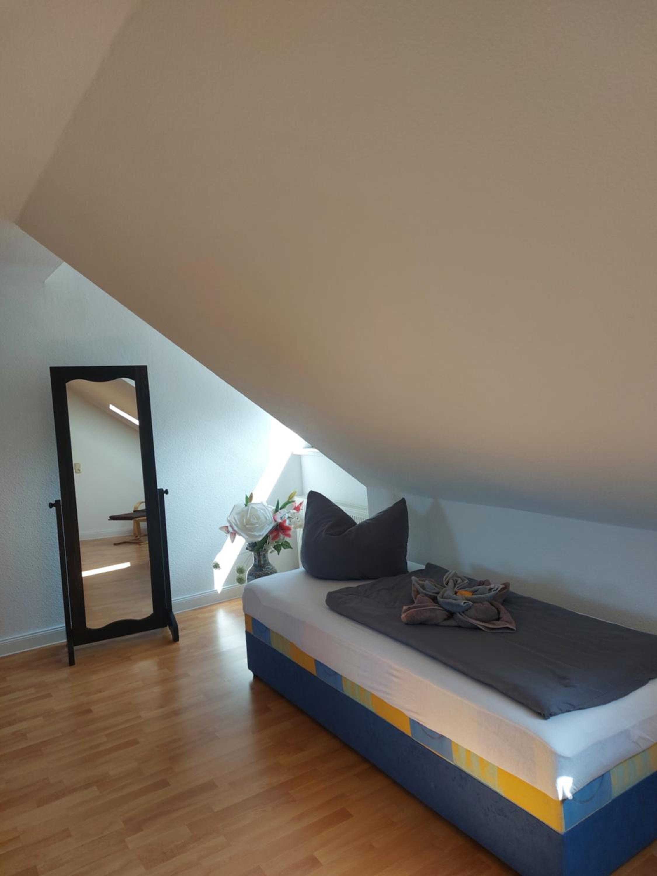 Basic Triple Room with Shared Bathroom photo 1