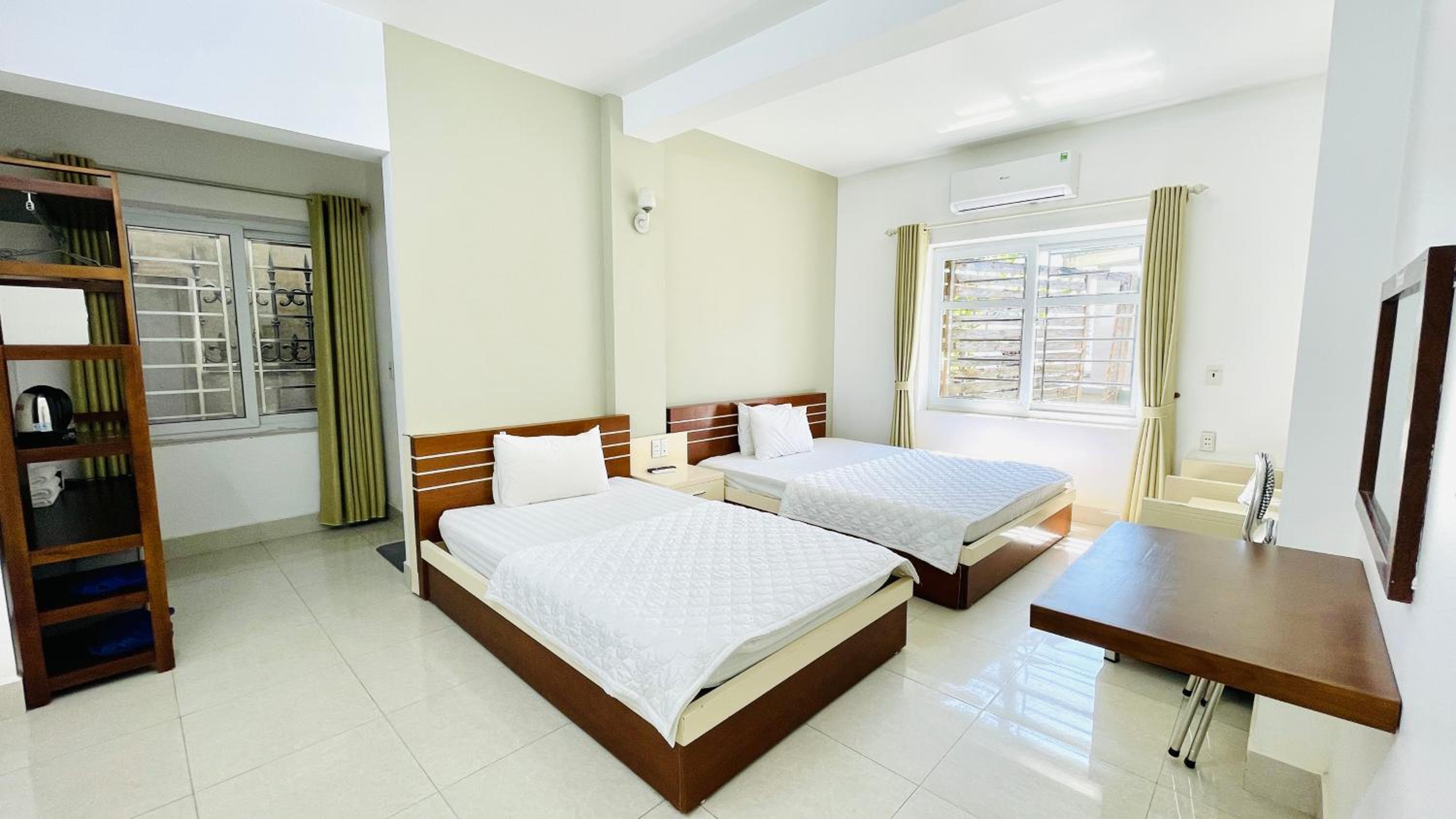 Economy Triple Room - Photo 6