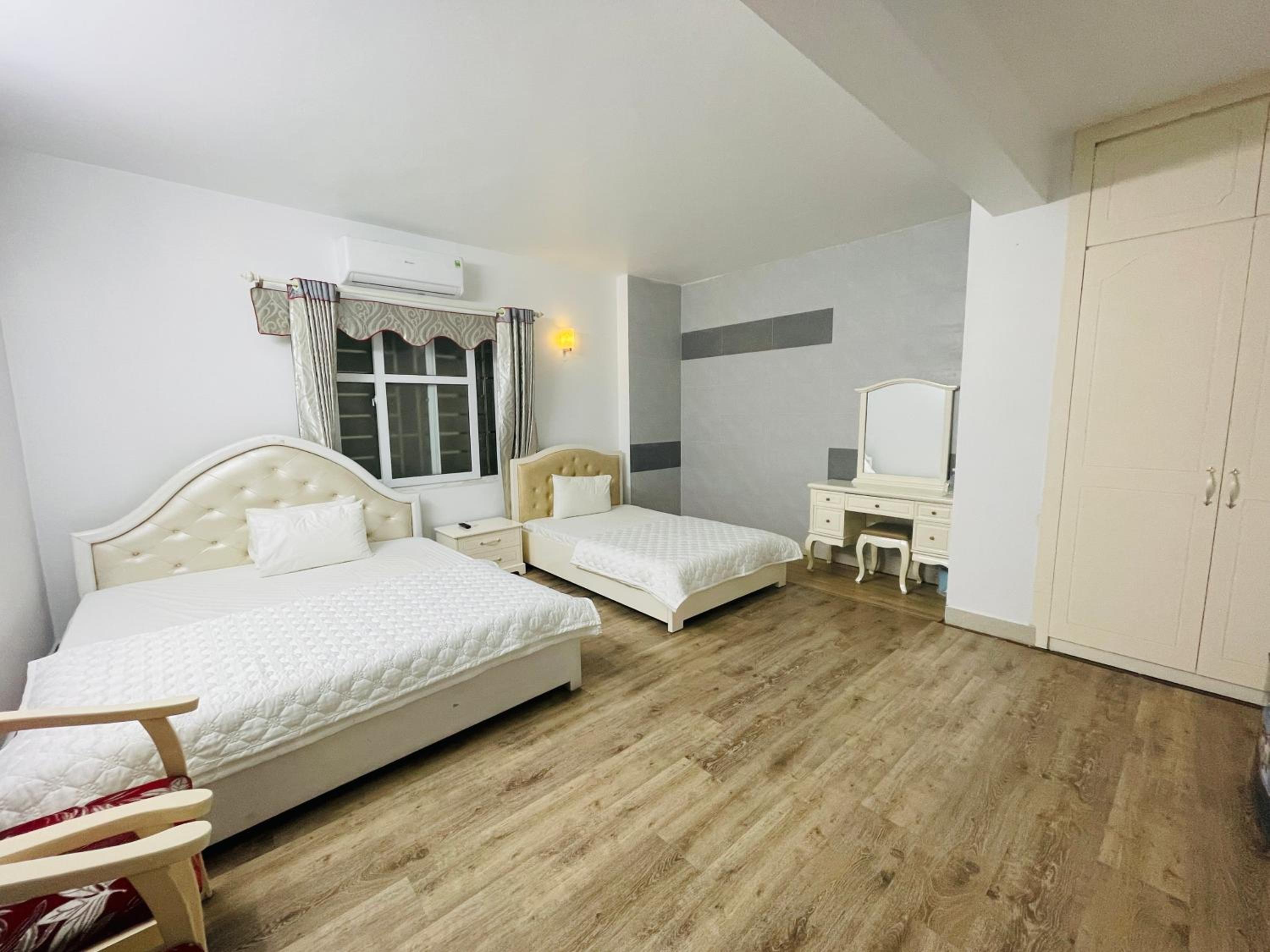Economy Triple Room - Photo 1