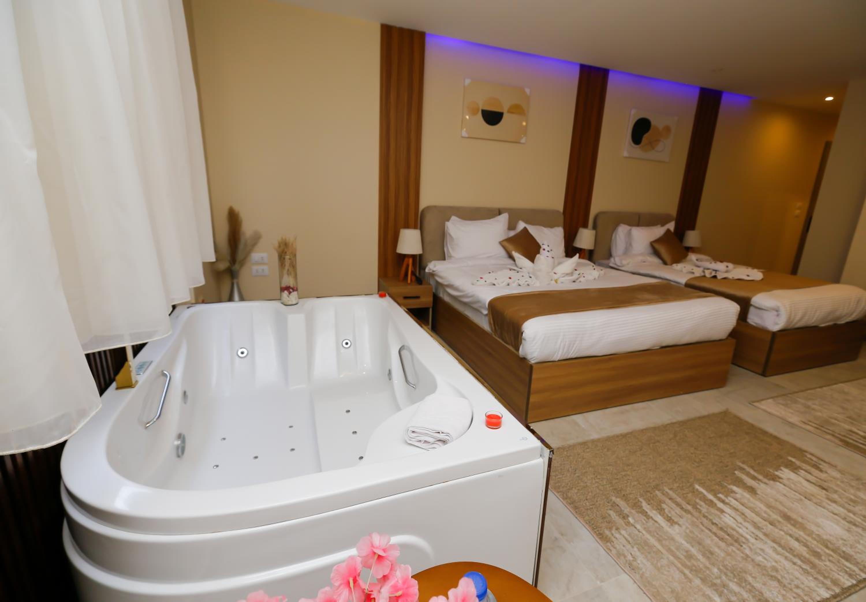 Triple Room Pyramids view with jacuzzi