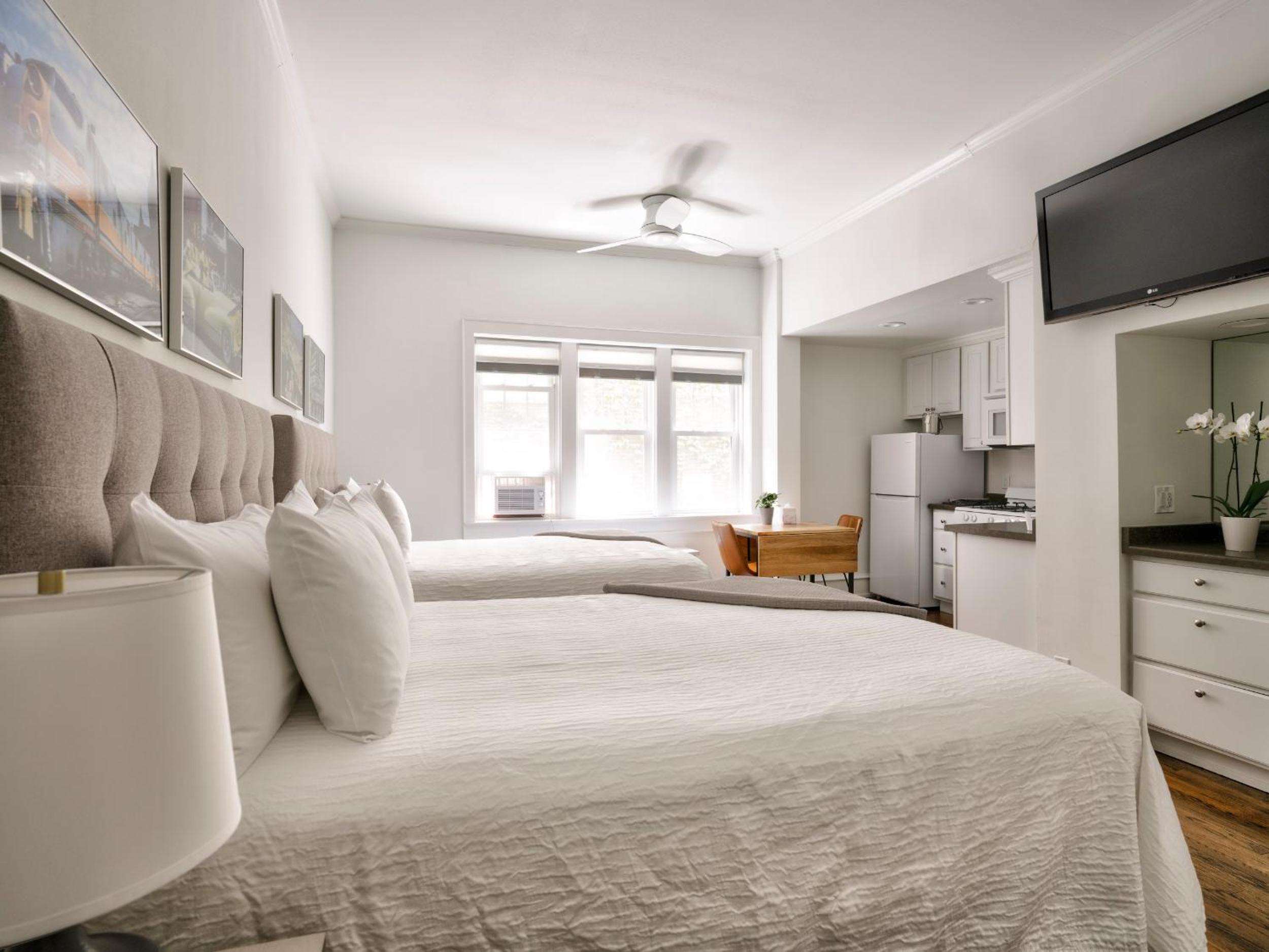 Deluxe Queen Room with Two Queen Beds - Photo 1