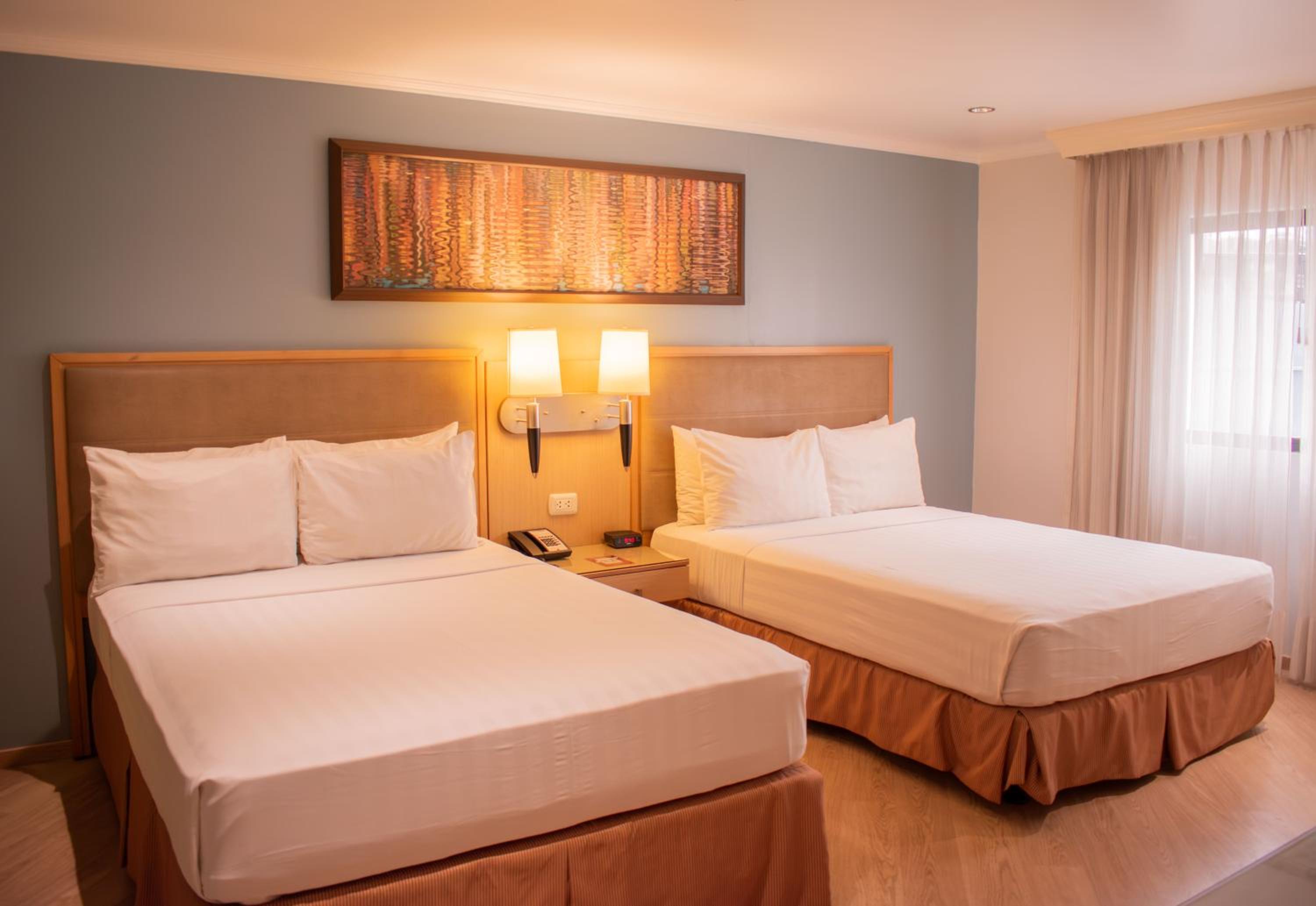 Double Suite with Two Double Beds - Non-Smoking photo 1