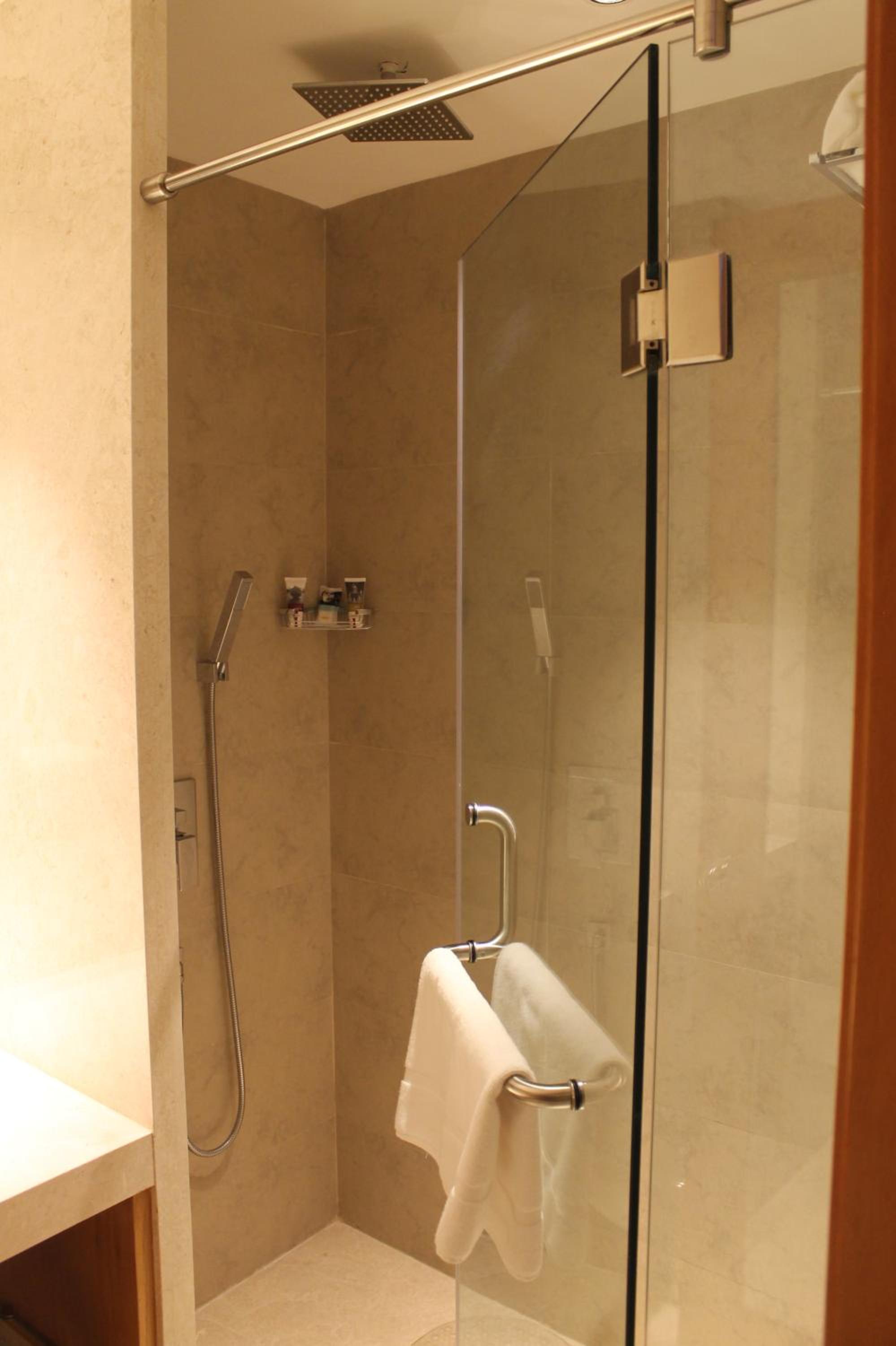 Premier Queen Room - Executive Floor with access to cocktail hours at predetermined timings,15%off on Food And Soft Beverage,Laundry & Travel desk.