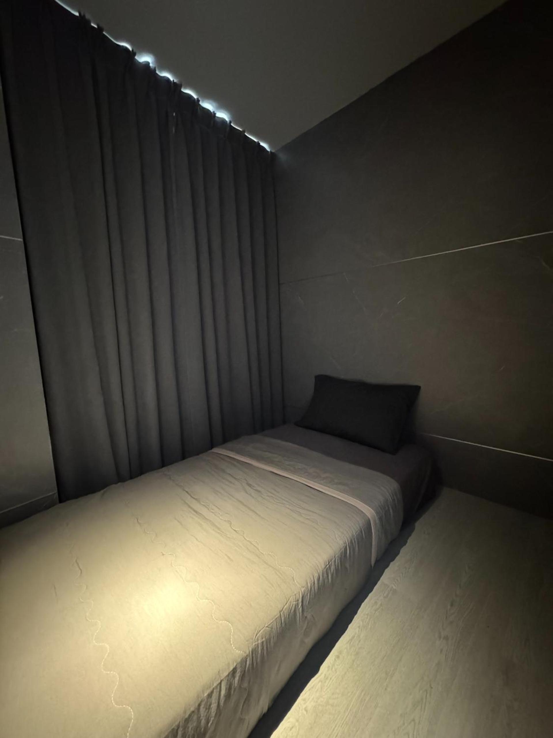 Single Bed in Dormitory Room