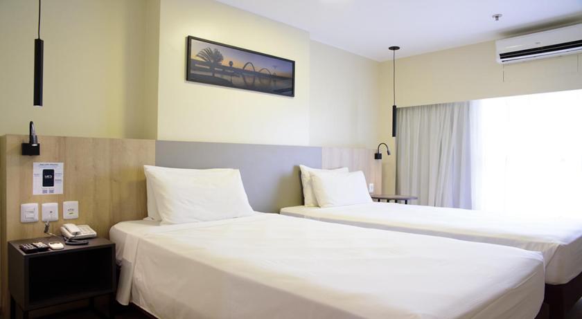 Quarto Deluxe com duas camas de solteiro” photo 1