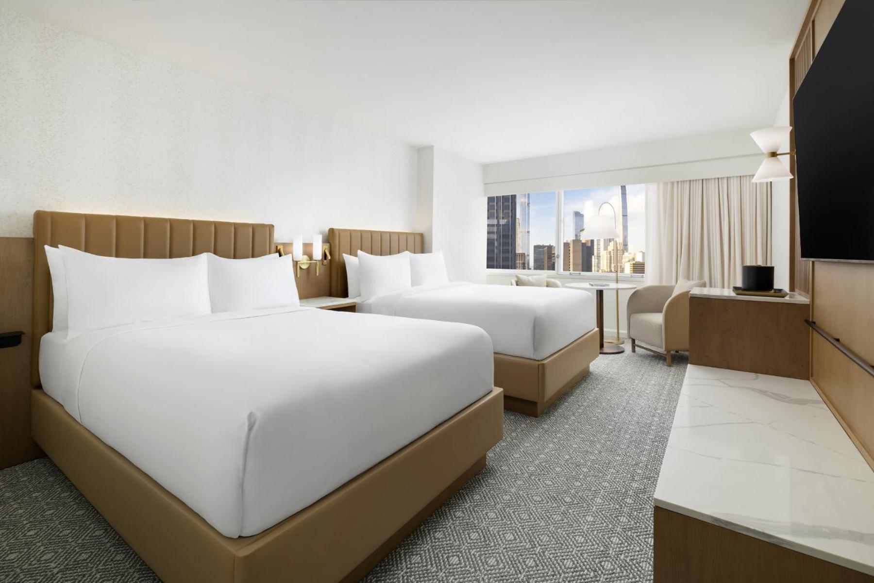 Corner Room with Two Double Beds and Tub - Accessible photo 2