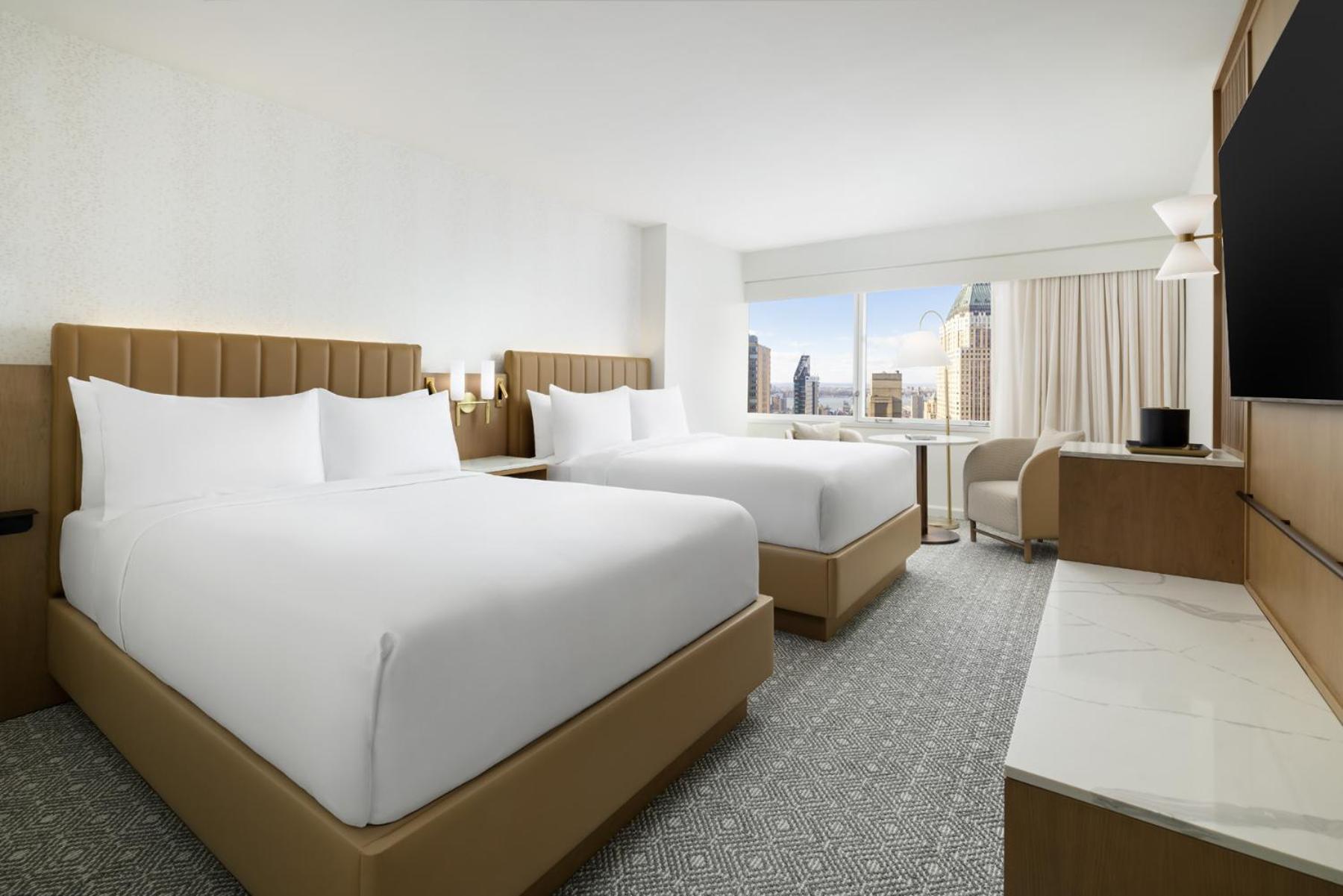 Corner Room with Two Double Beds and Tub - Accessible photo 3