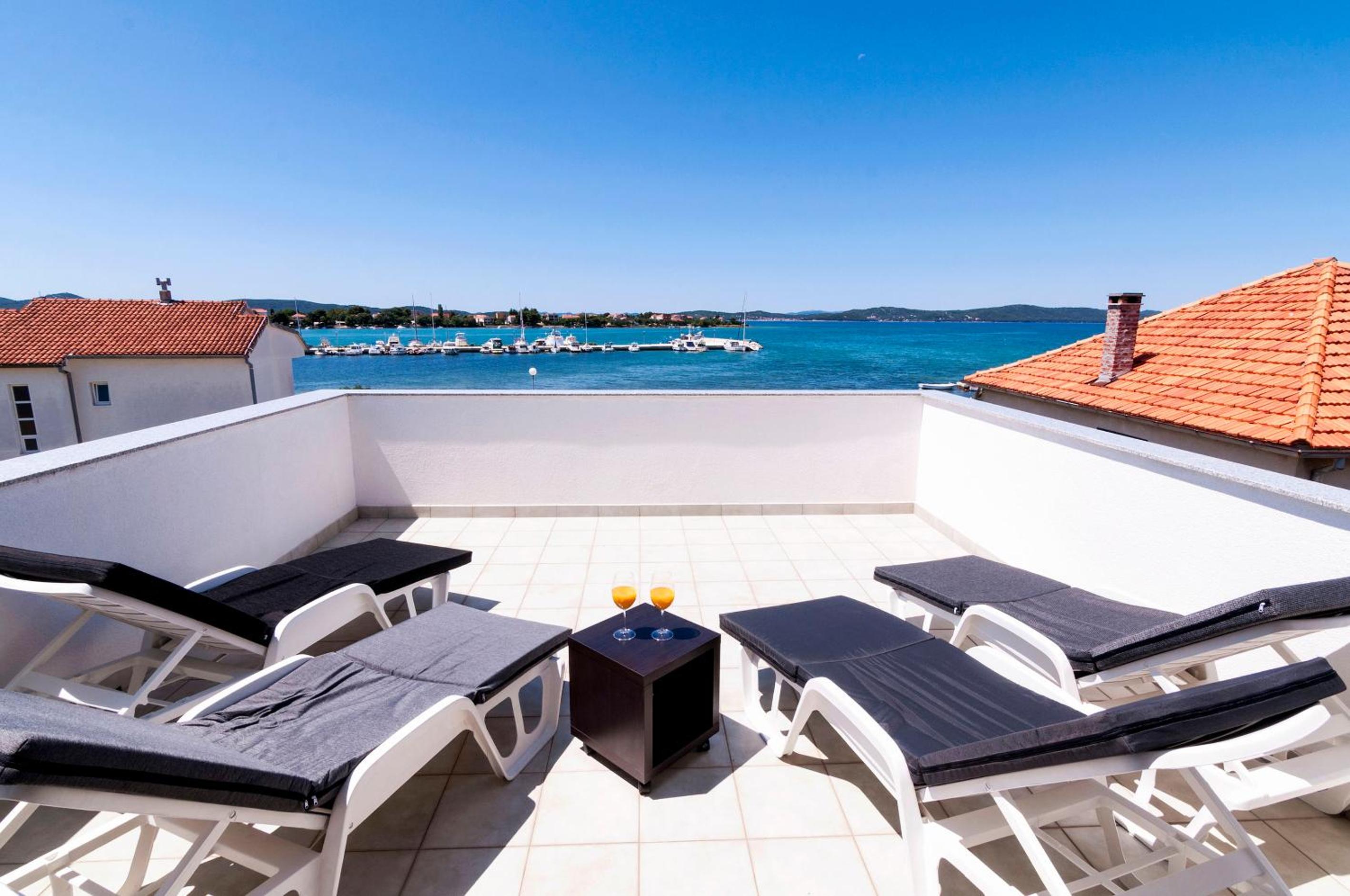 Duplex Two-bedroom Apartment with Terrace and Sea View photo 1