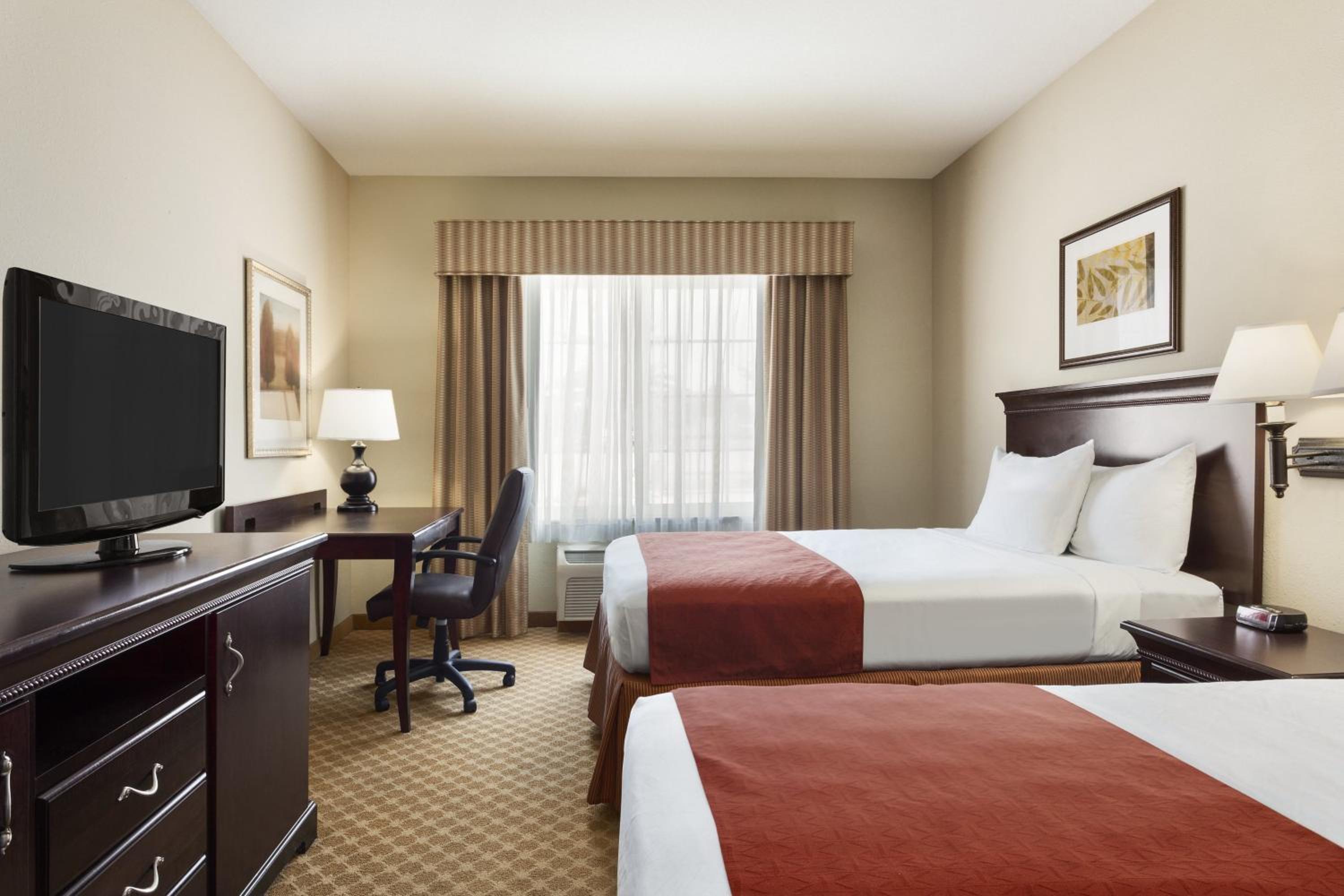 Guest Room with Two Queen Beds - Photo 1