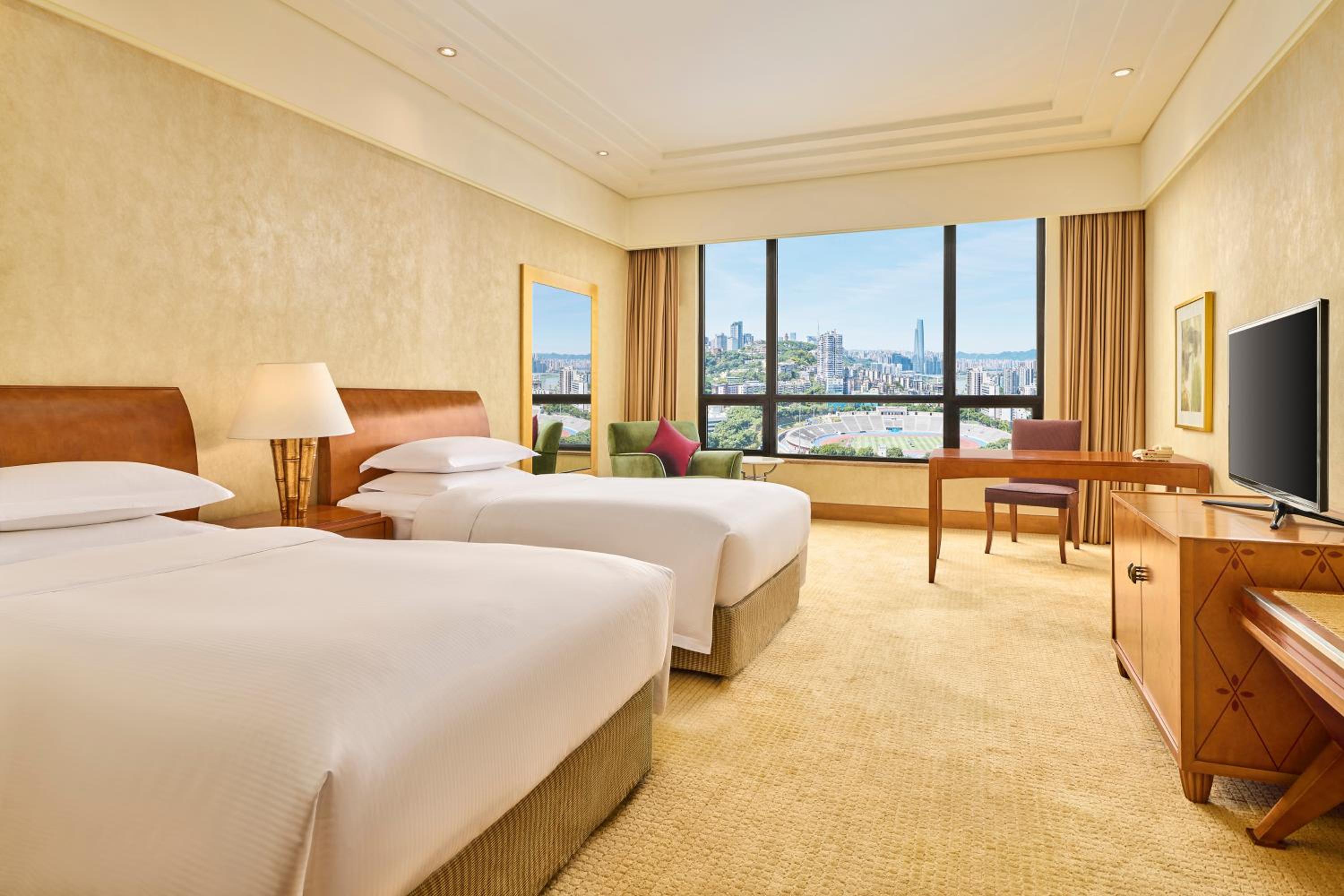 Deluxe Twin Room with City View - Photo 13