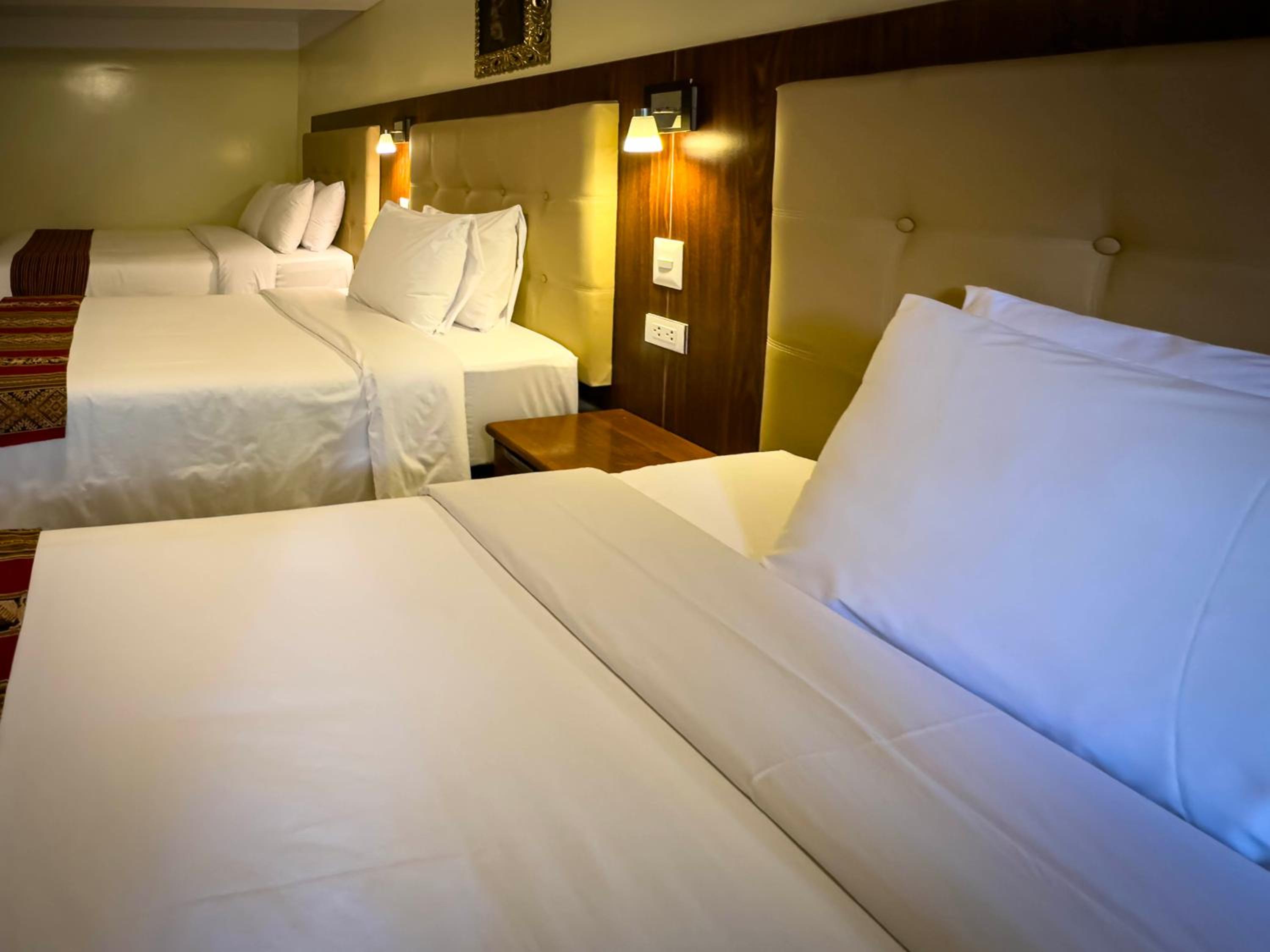 Quadruple Room with Balcony photo 2