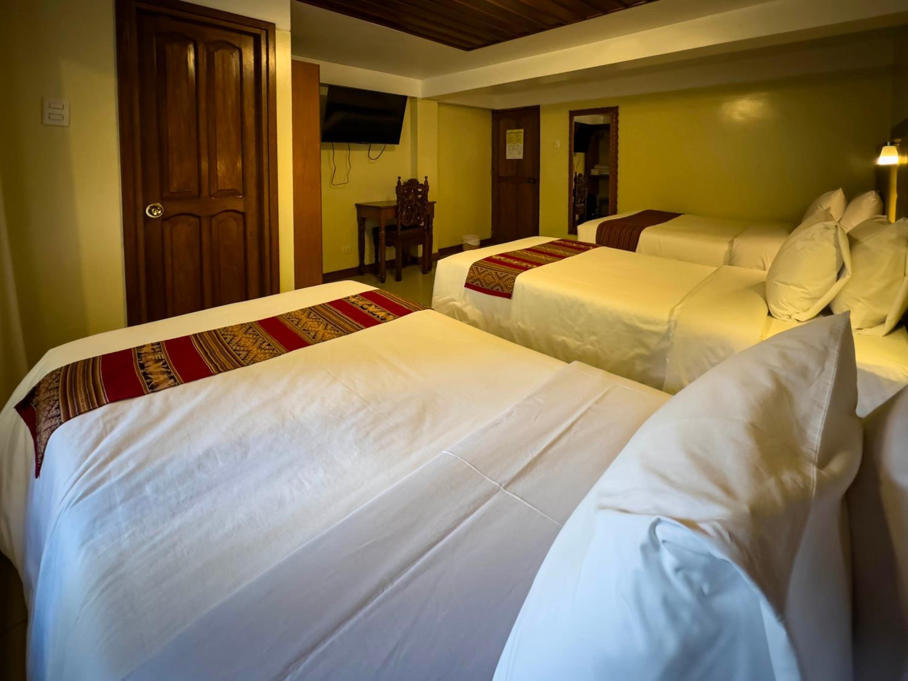 Quadruple Room with Balcony photo 3