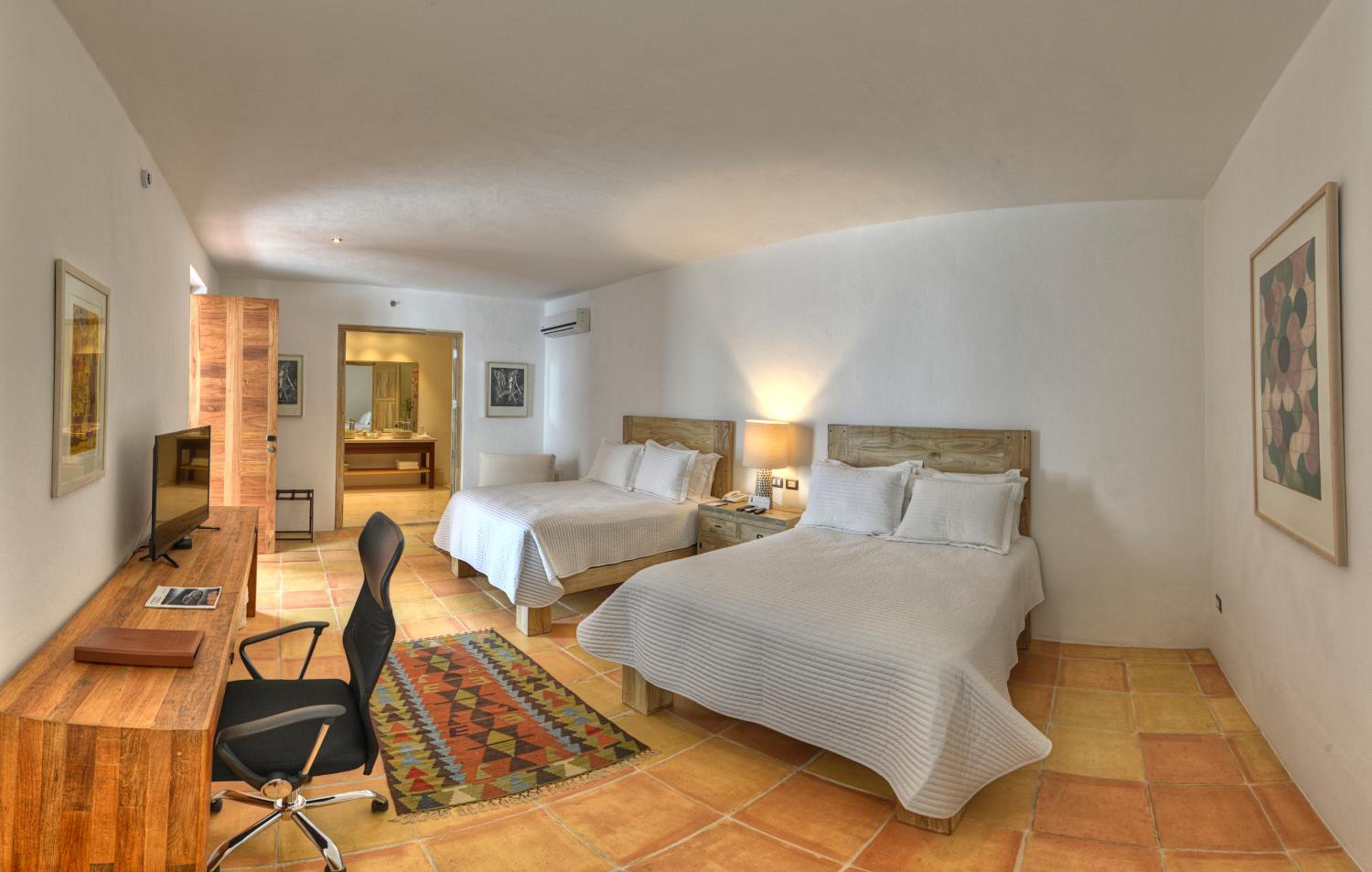 Deluxe Queen Room with Two Queen Beds - Photo 1
