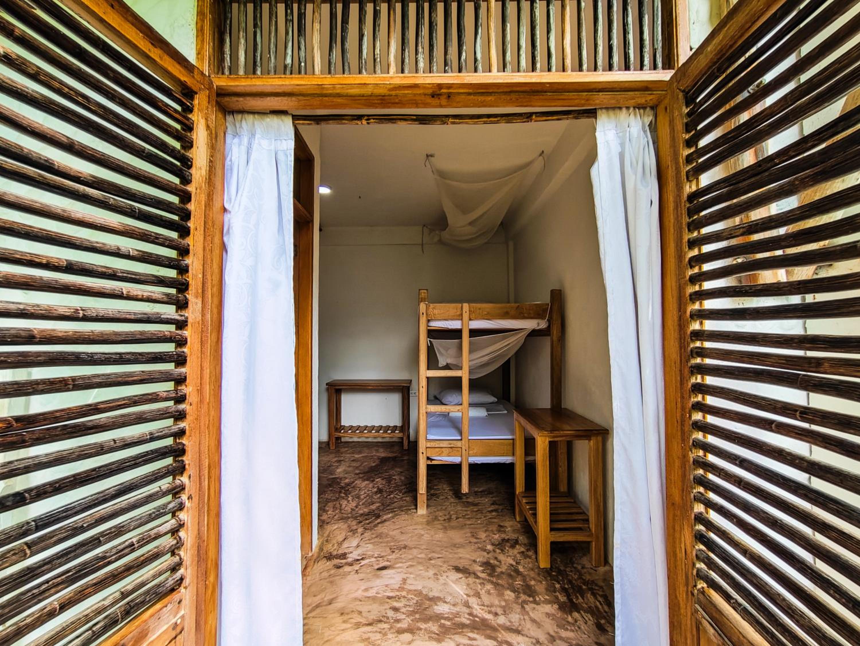 Quadruple Room with Private Bathroom photo 3