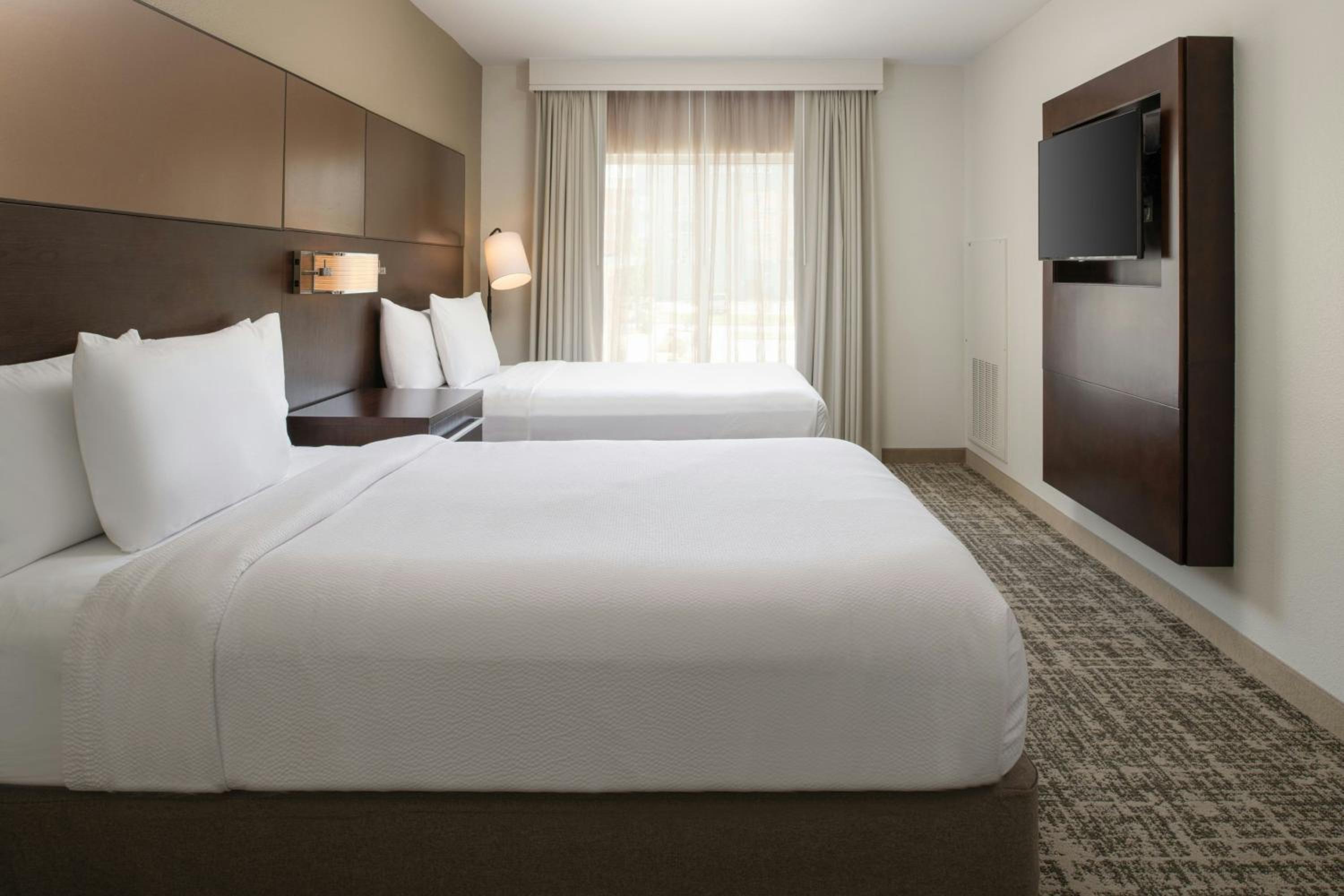 One-Bedroom Suite with Two Queen Beds and Sofa Bed - Hearing Accessible photo 1