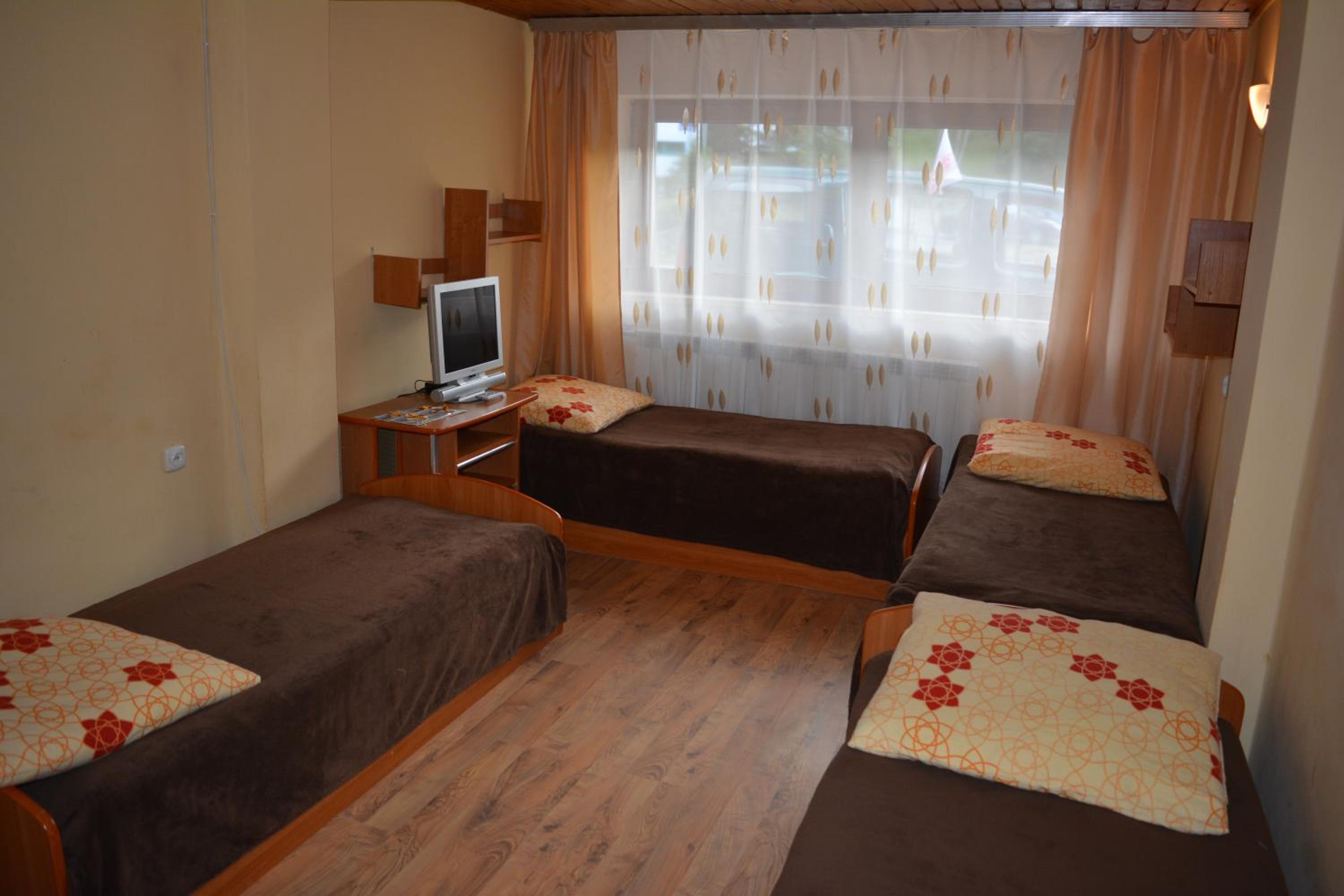 Quadruple Room with Private Bathroom photo 1