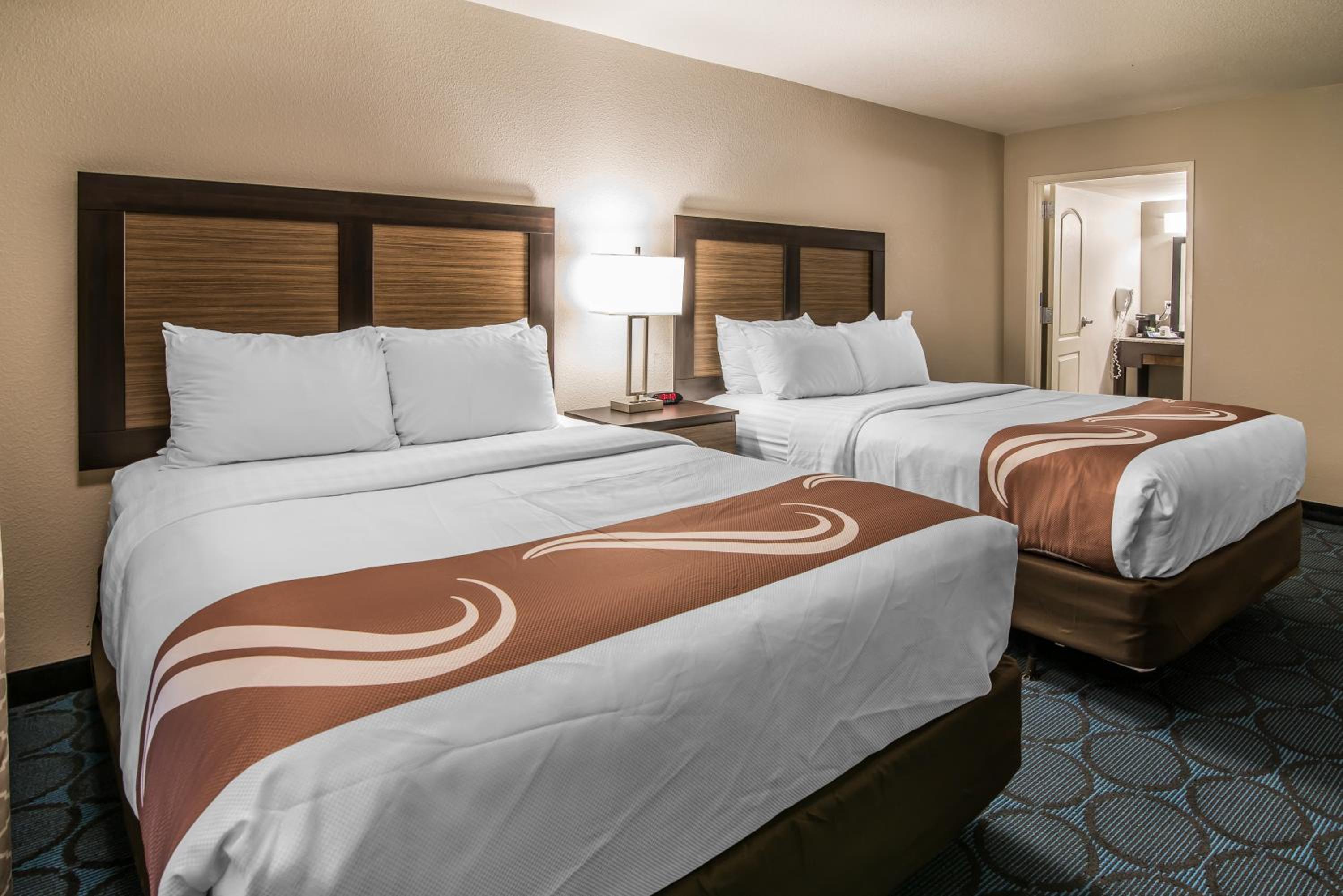 Queen Room with Two Queen Beds - Non-Smoking - Photo 1