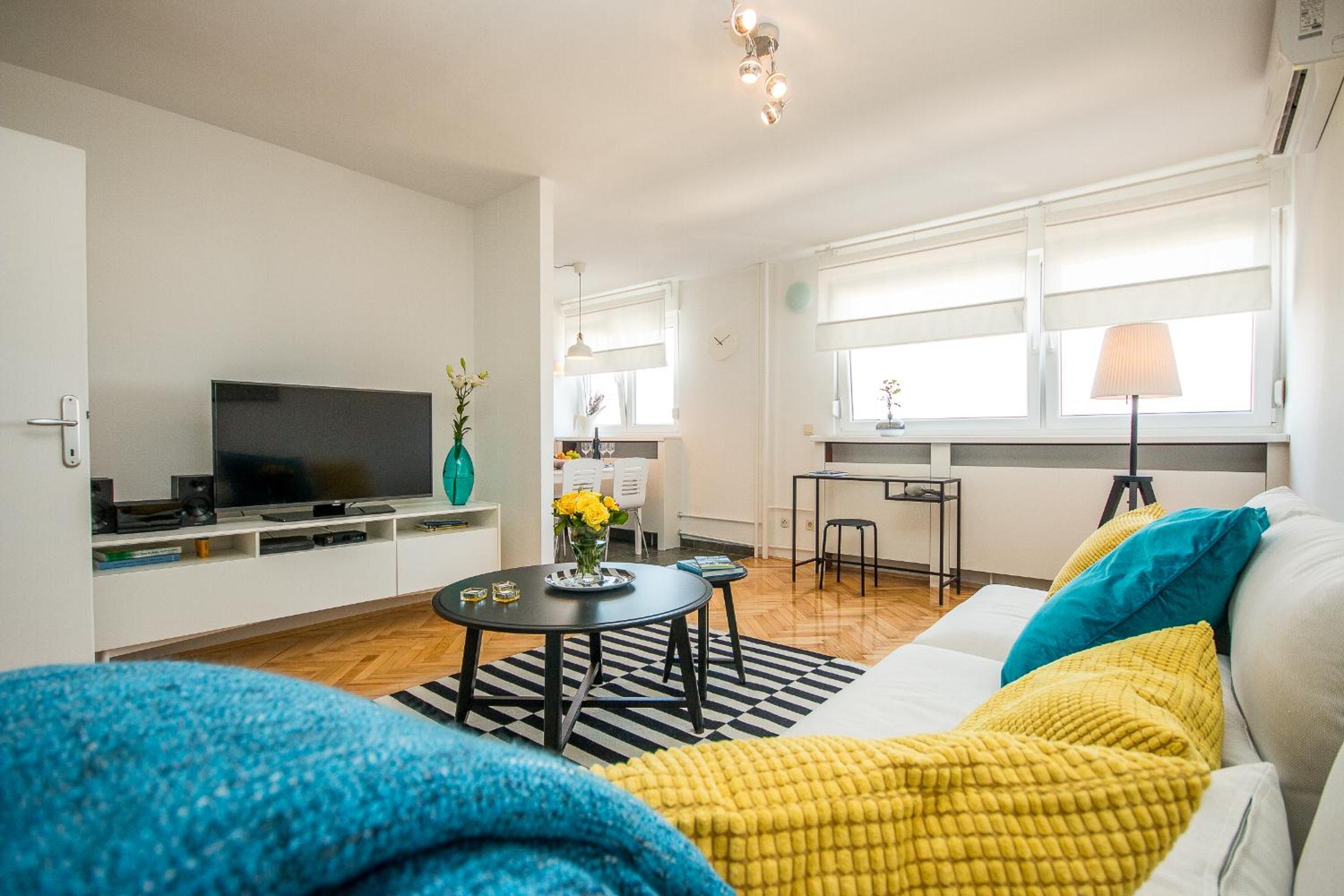 Two-Bedroom Apartment with Balcony and City View 