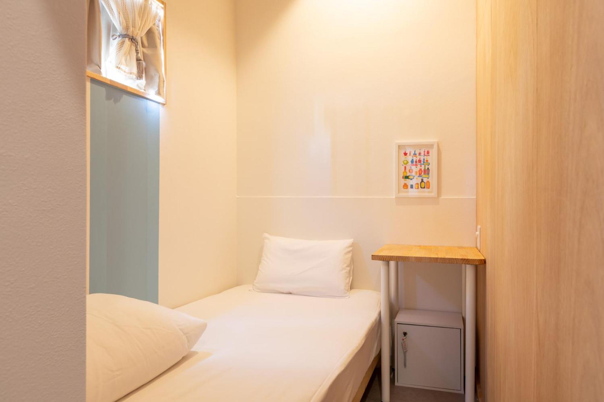 Single Bed in Dormitory Room