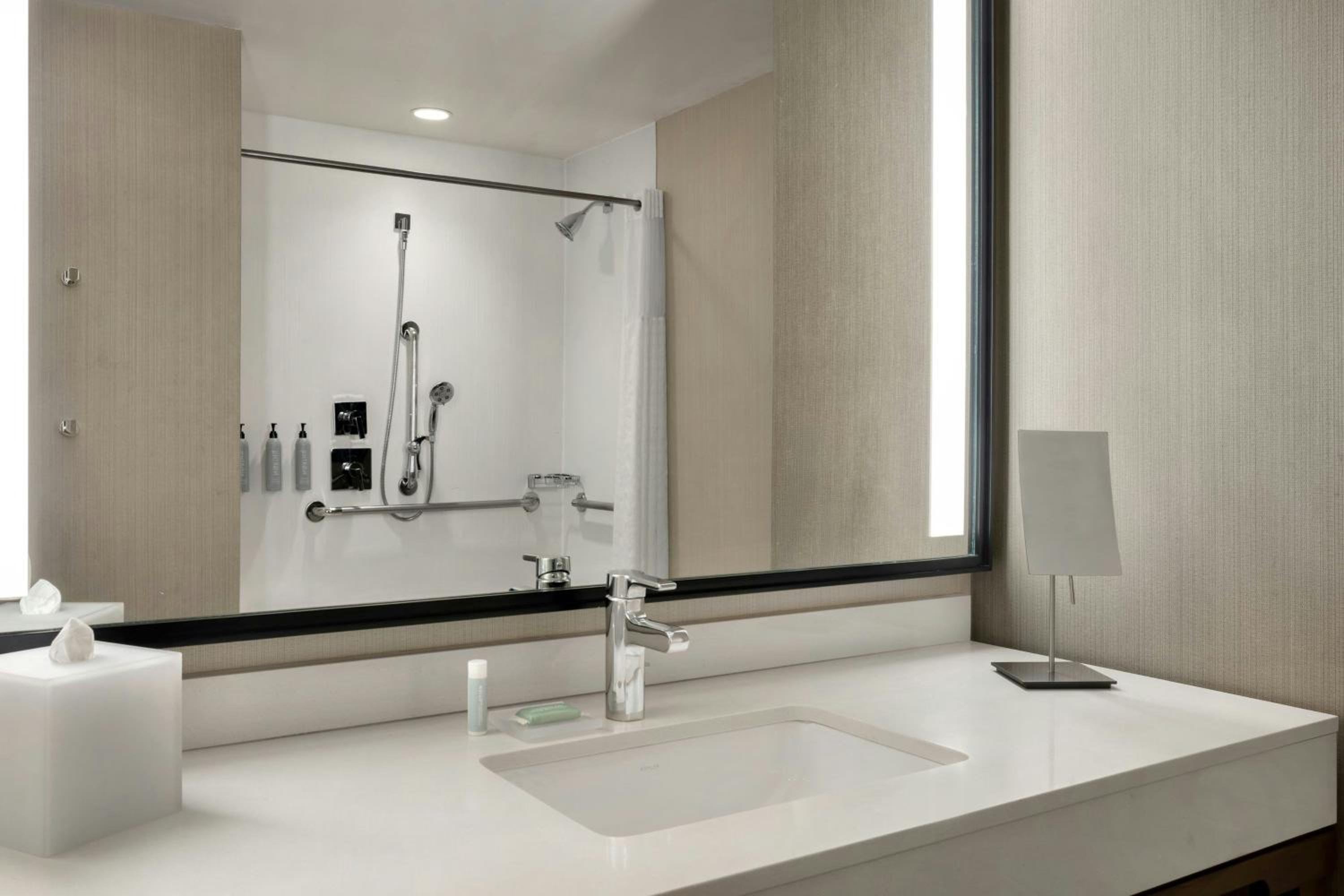 King Room with Sofa Bed and Roll-in Shower - Mobility and Hearing Accessible
