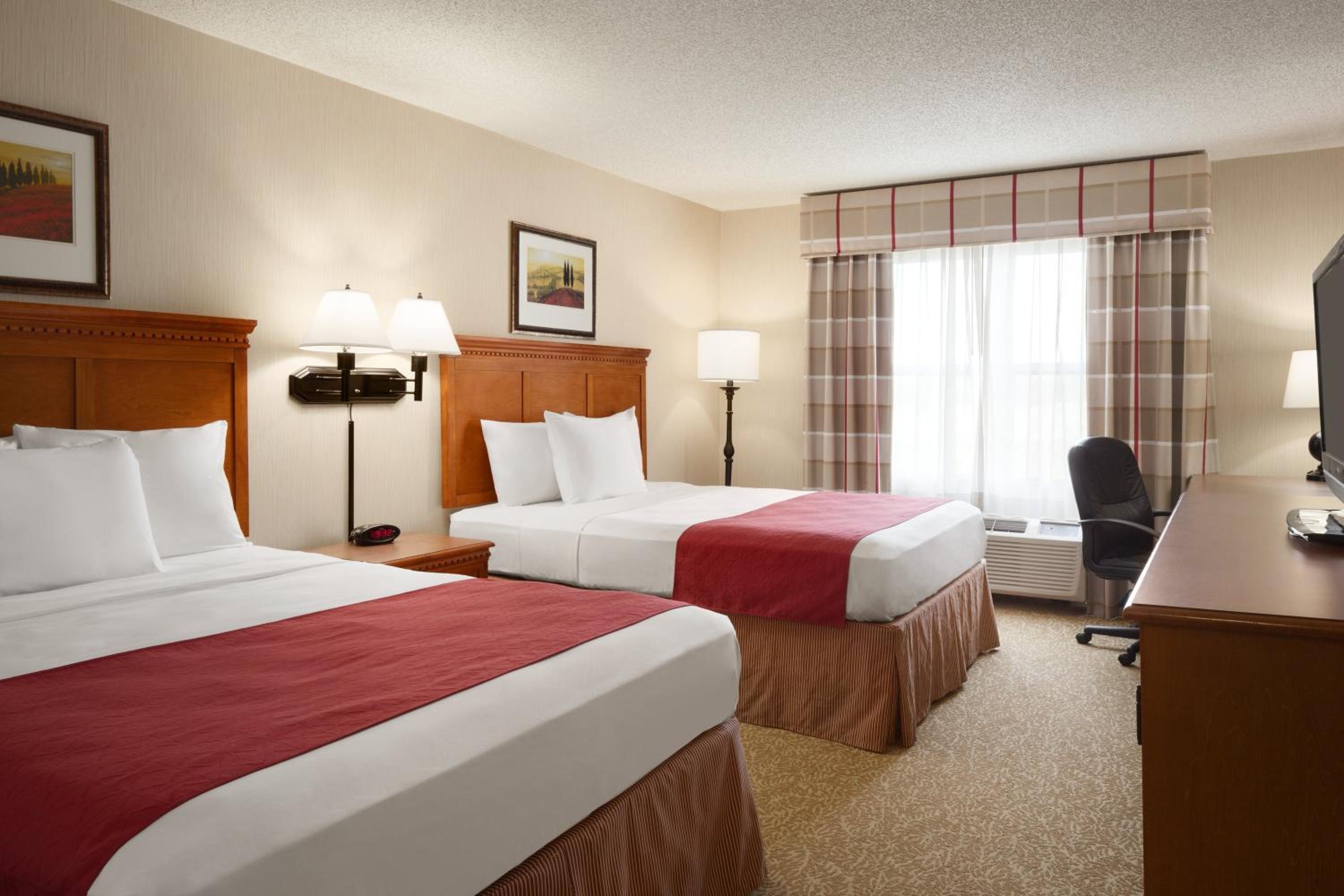 Queen Room with Two Queen Beds - Photo 1