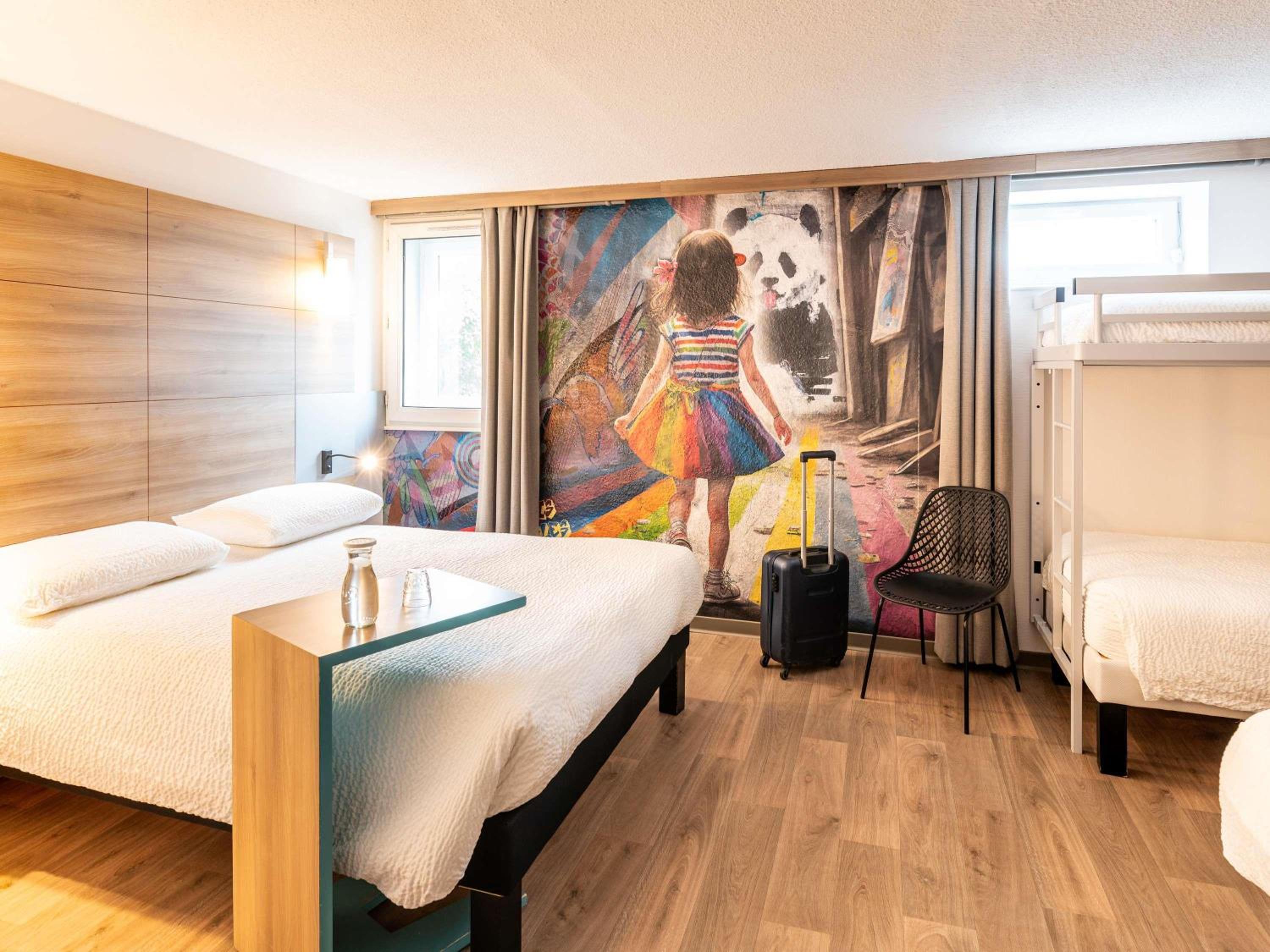 Family Room with One Double Bed, Two Single Beds and One Sofa Bed