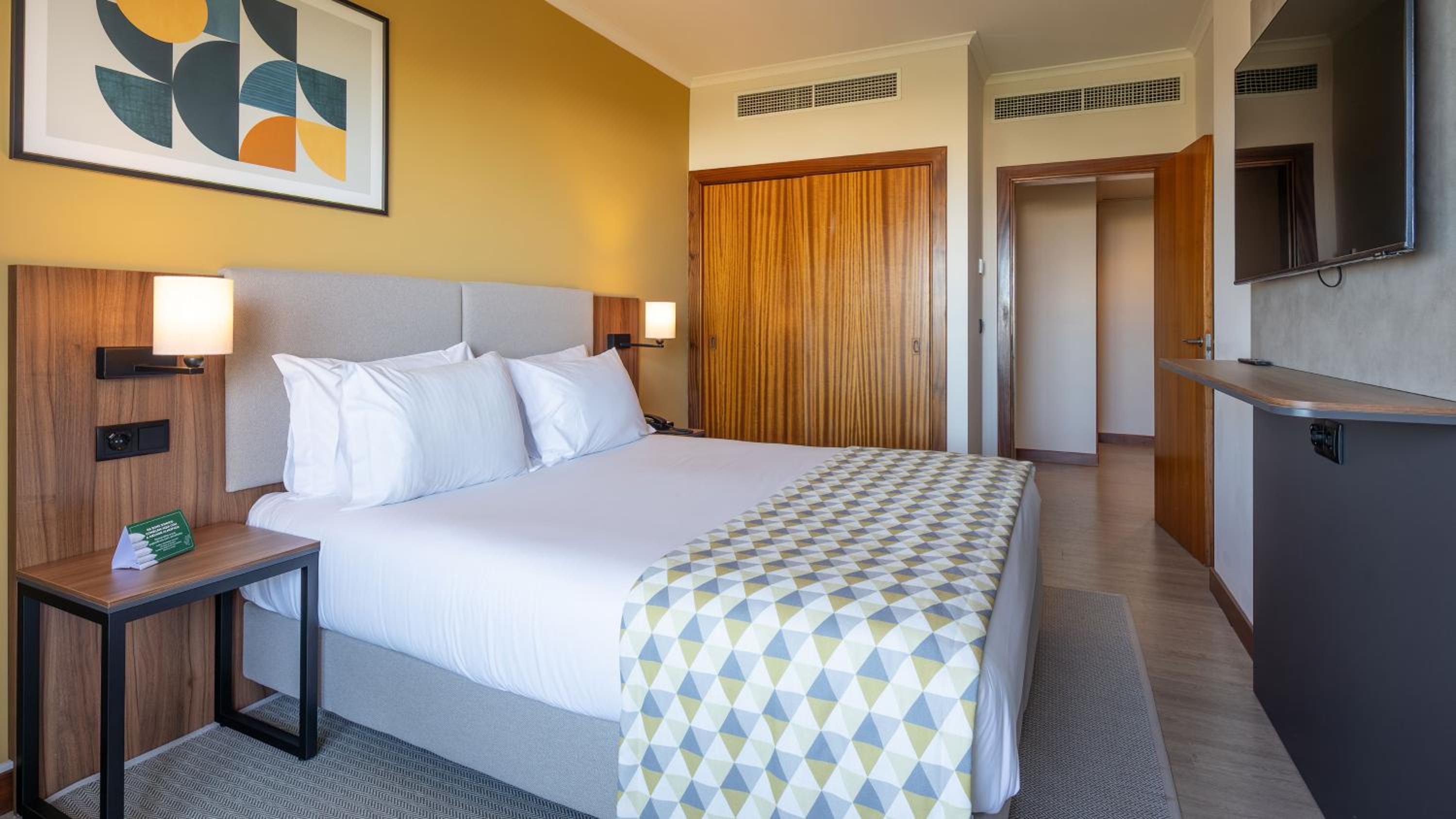 One-Bedroom Suite with Furnished Balcony and Single Sofa Bed