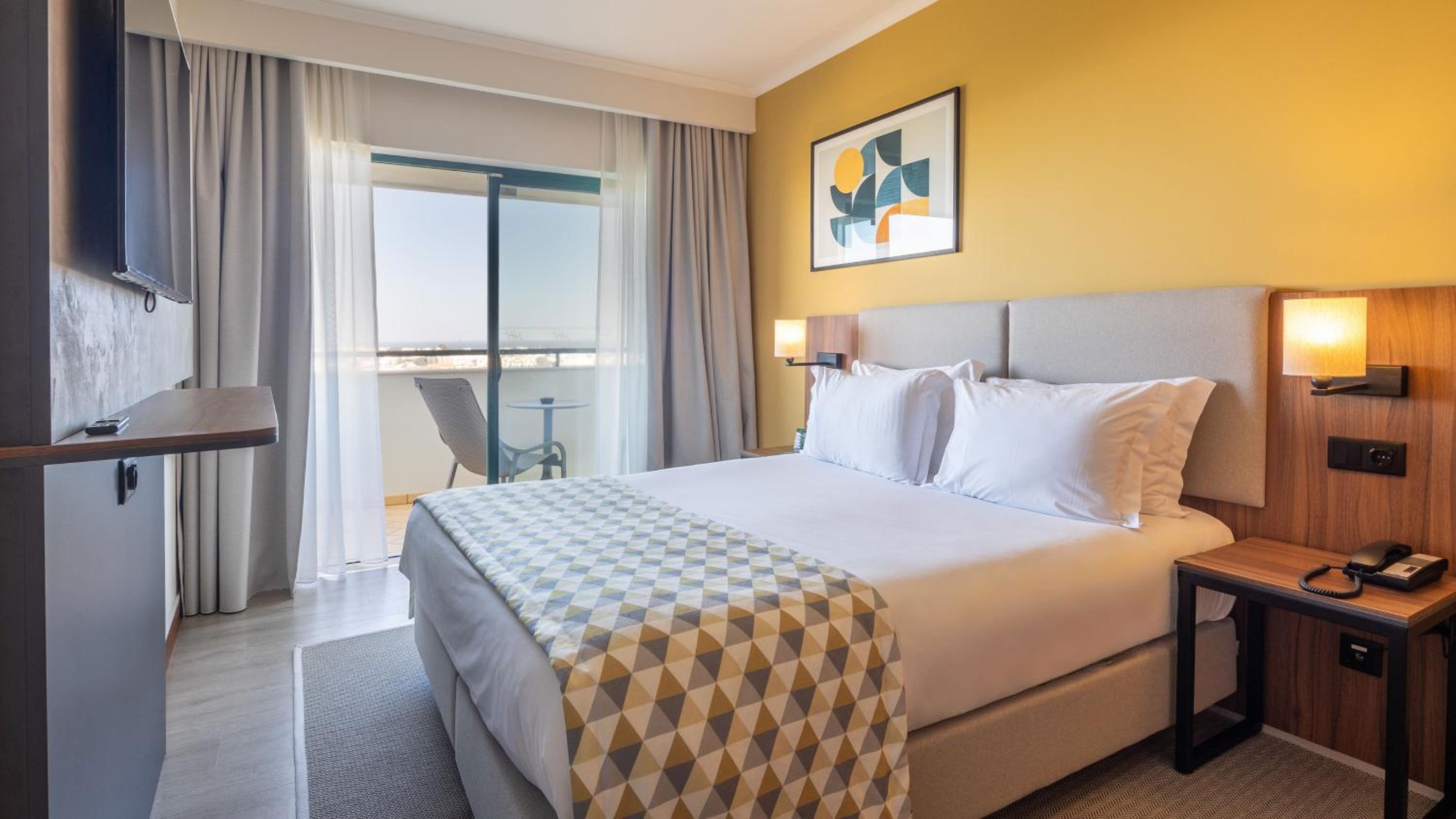 One-Bedroom Suite with Furnished Balcony and Single Sofa Bed