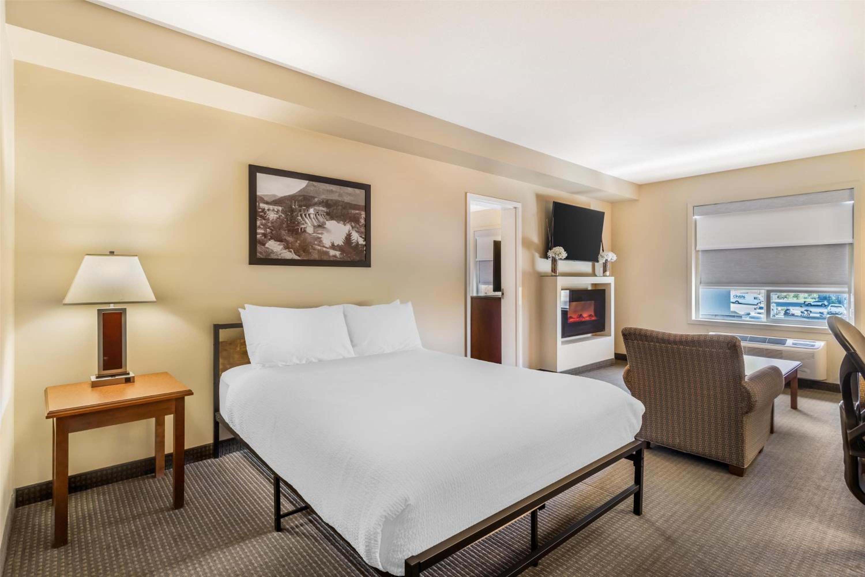 One-Bedroom Family Suite with One King, One Queen Bed and Sofa Bed - Non-Smoking