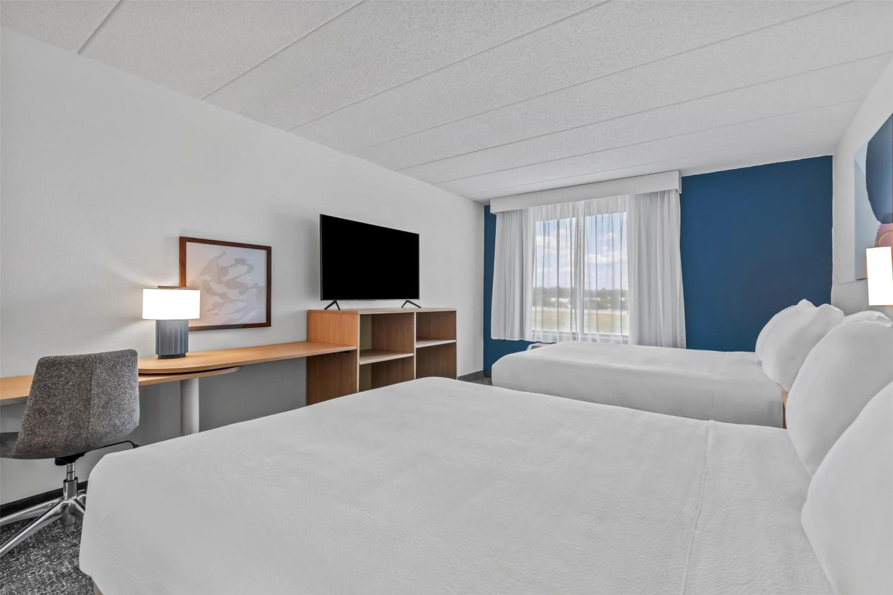 Queen Room with Two Queen Beds - Photo 1