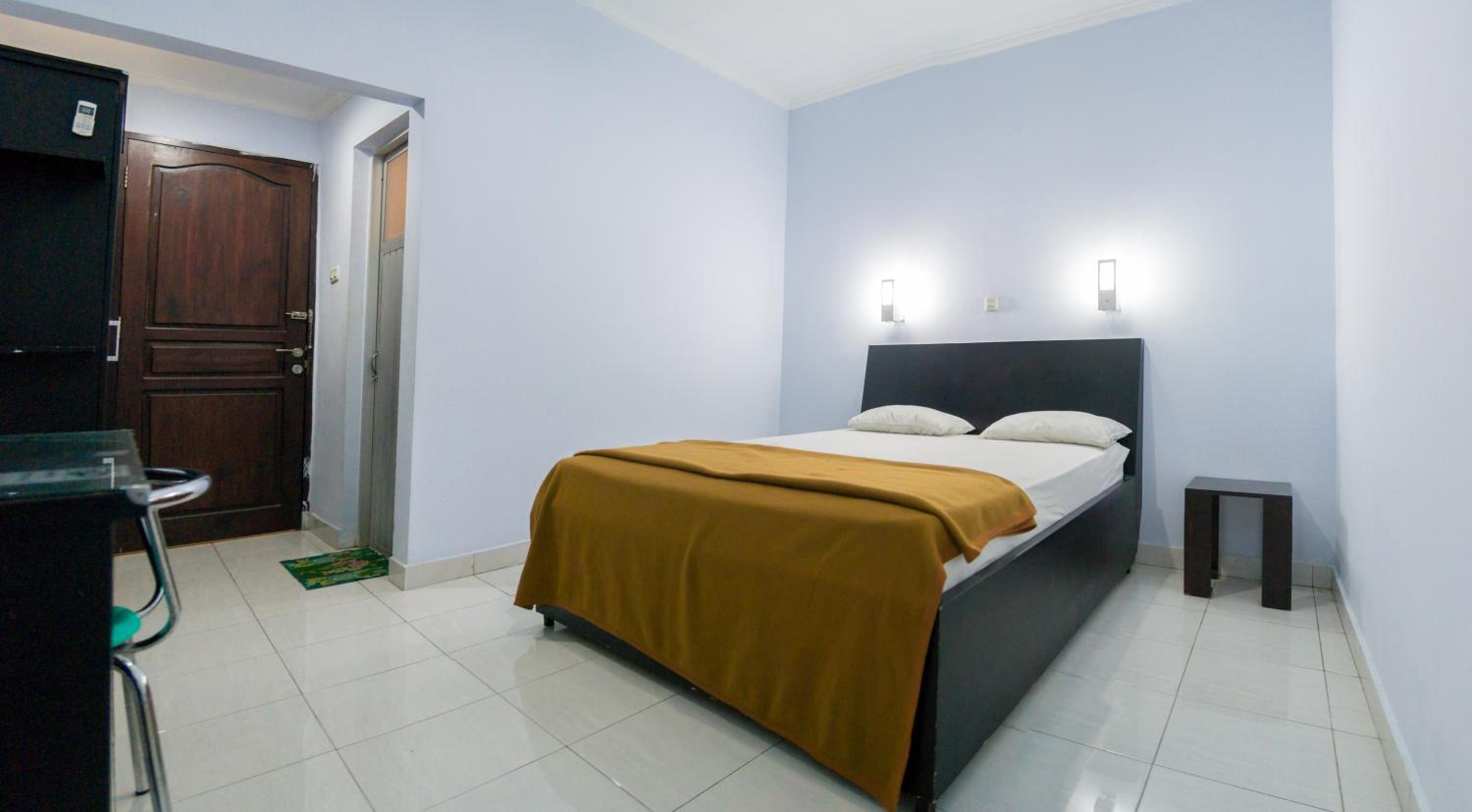 Deluxe Room (2 Adults + 1 Child) - Photo 8