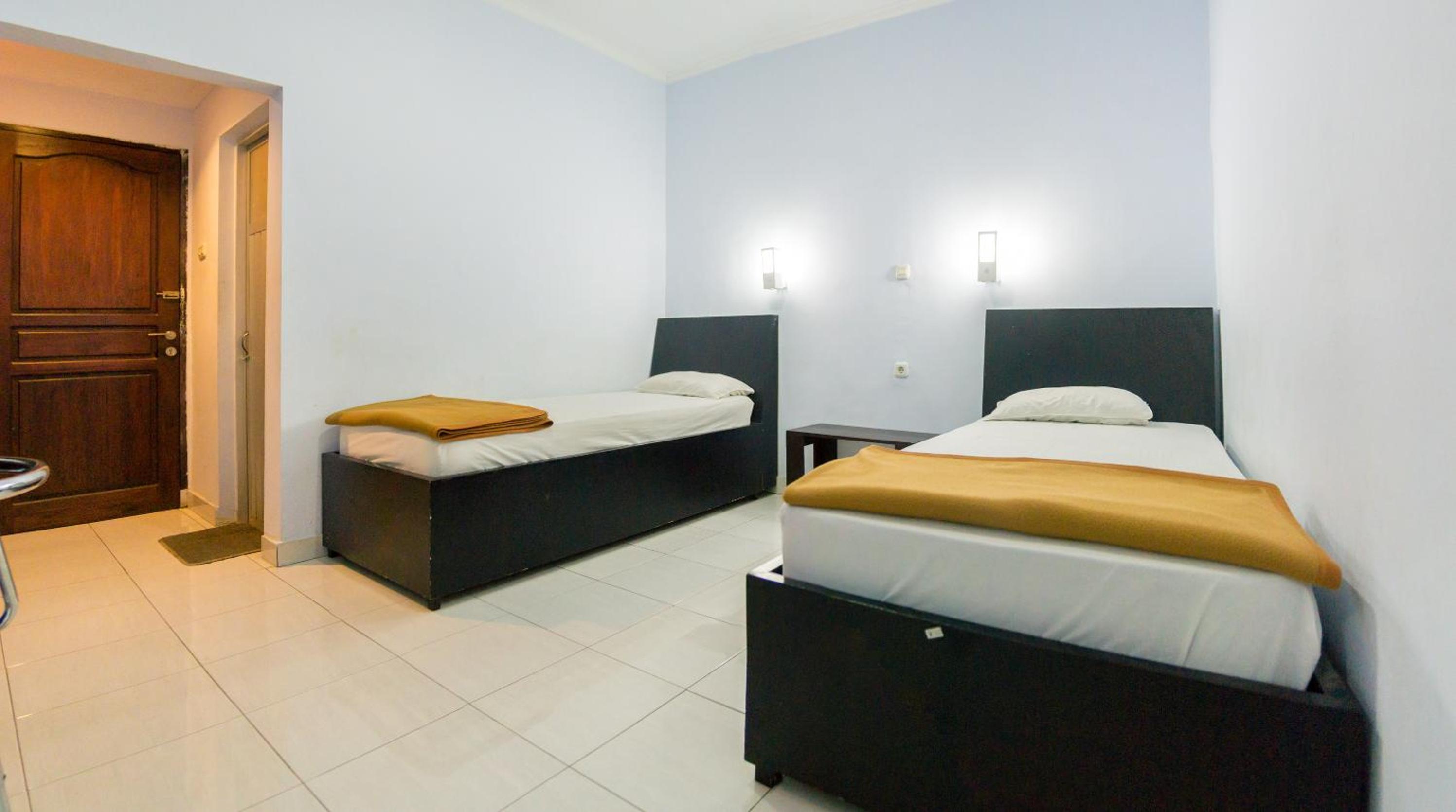 Deluxe Room (2 Adults + 1 Child) - Photo 7
