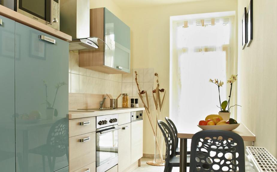 Three-Bedroom Apartment - Photo 2