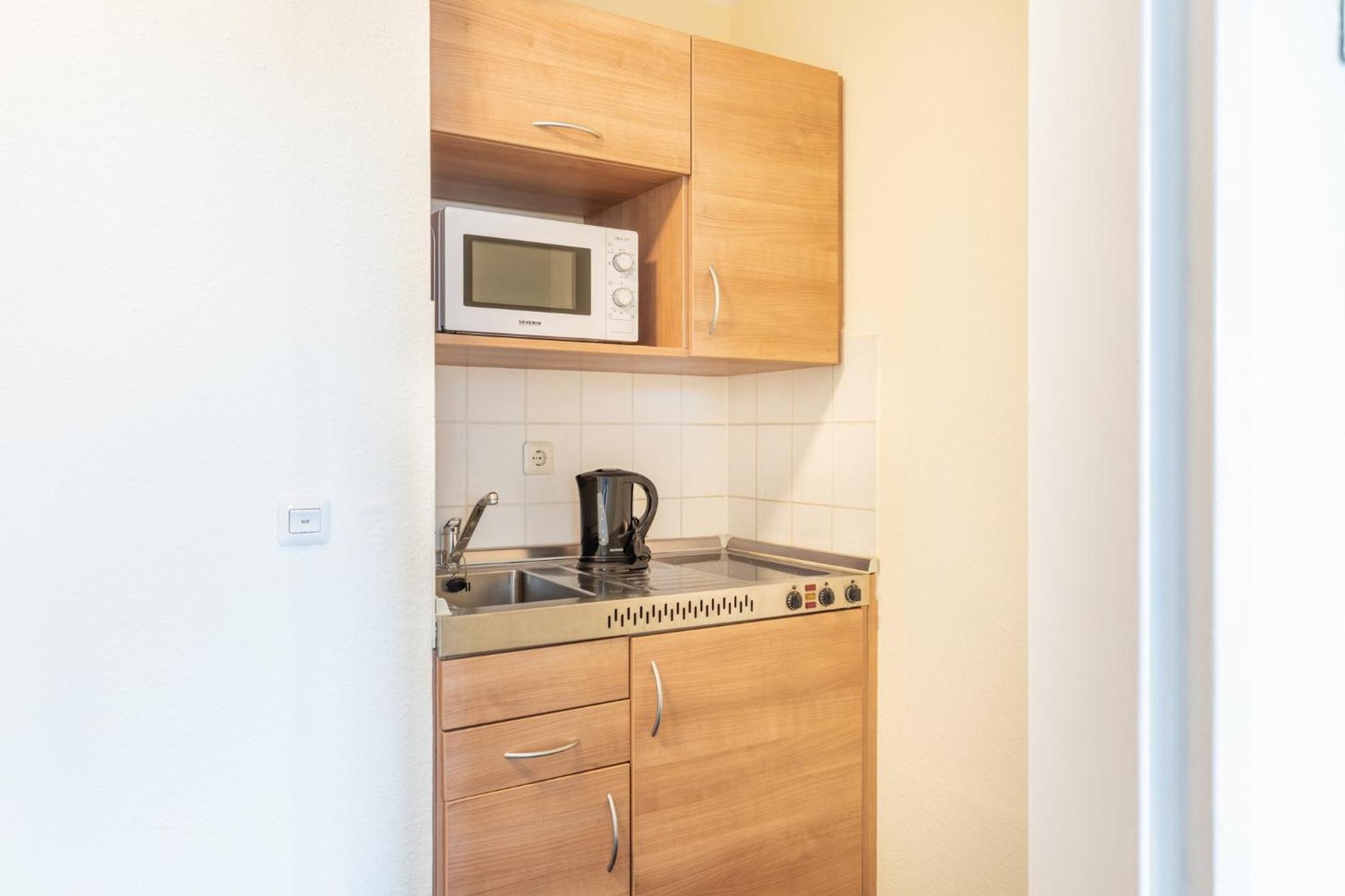 One-Bedroom Suite with Garden View and Kitchen