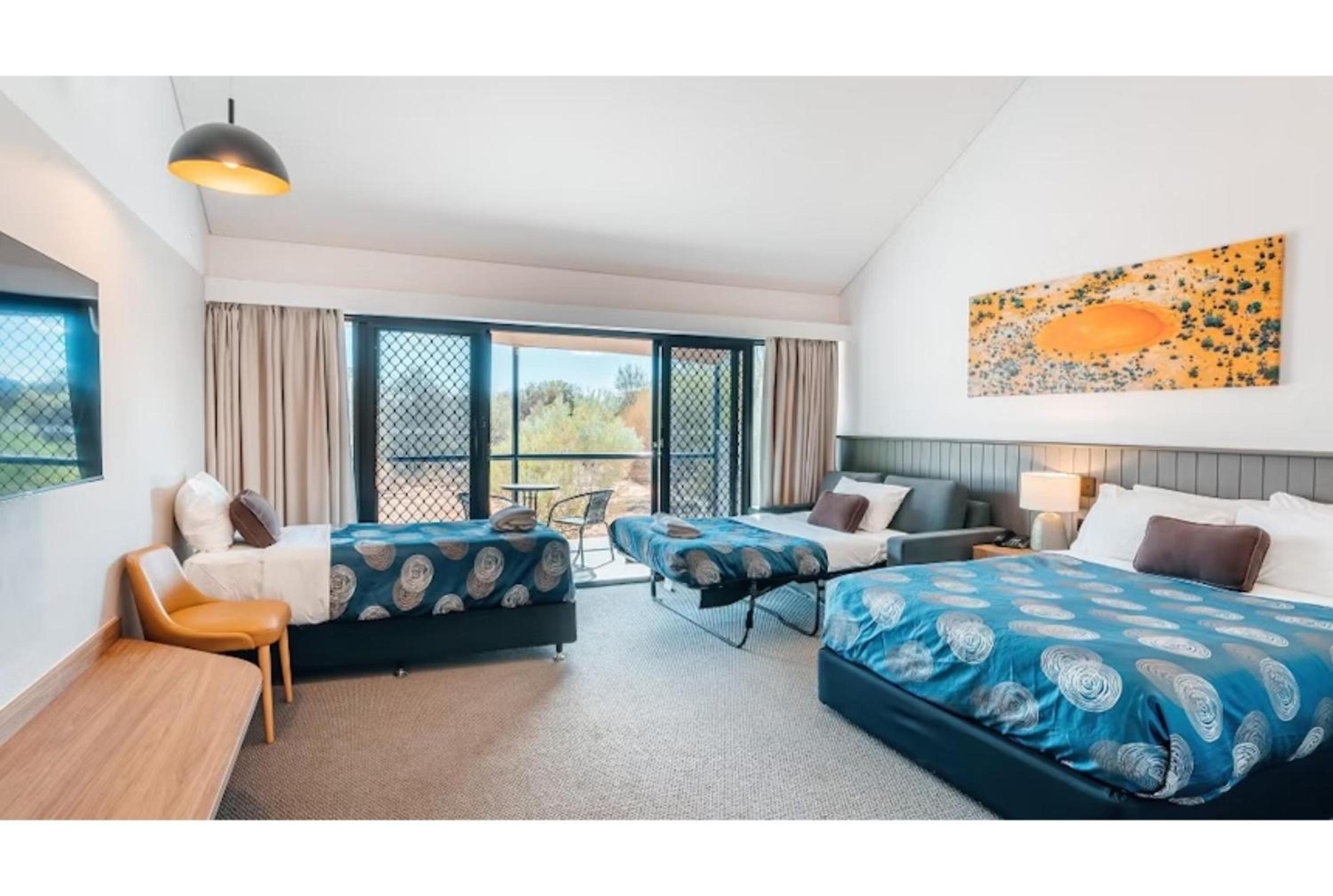 Standard Family Room - 1 Queen, 1 Single, 1 Sofabed