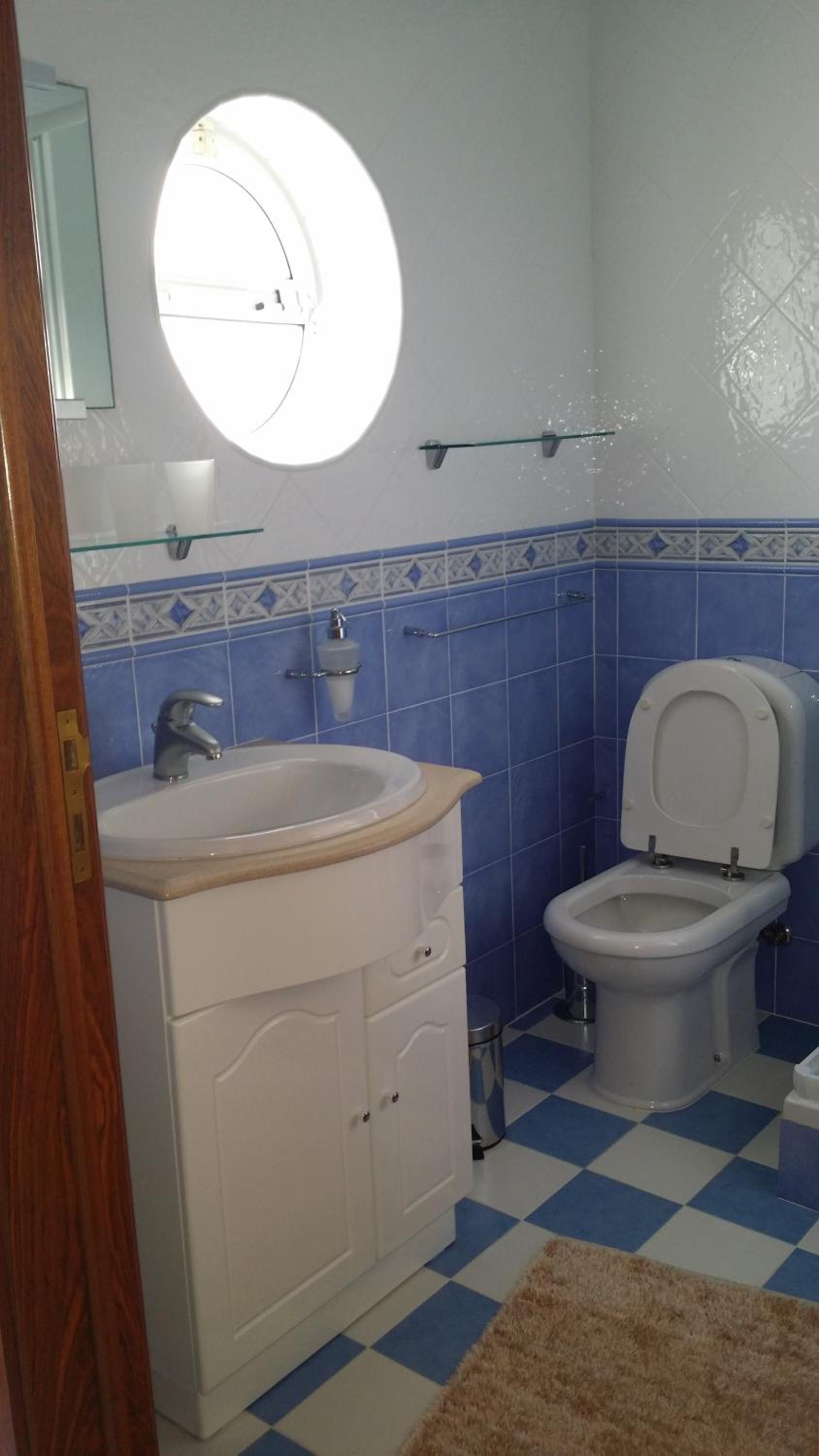 Three-Bedroom House - Photo 10