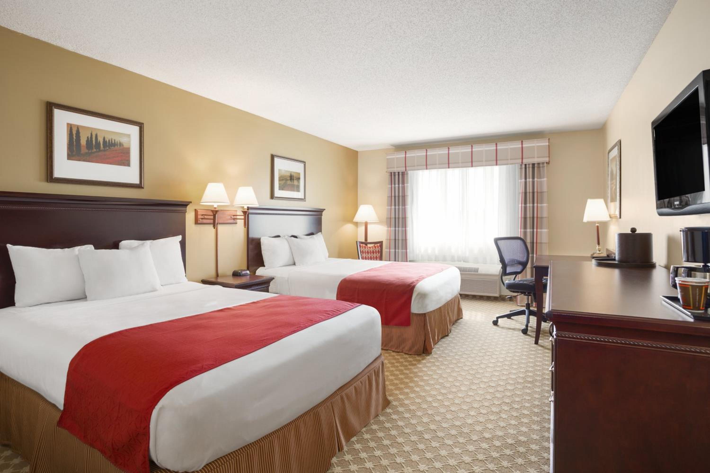 Queen Room with Two Queen Beds - Photo 1