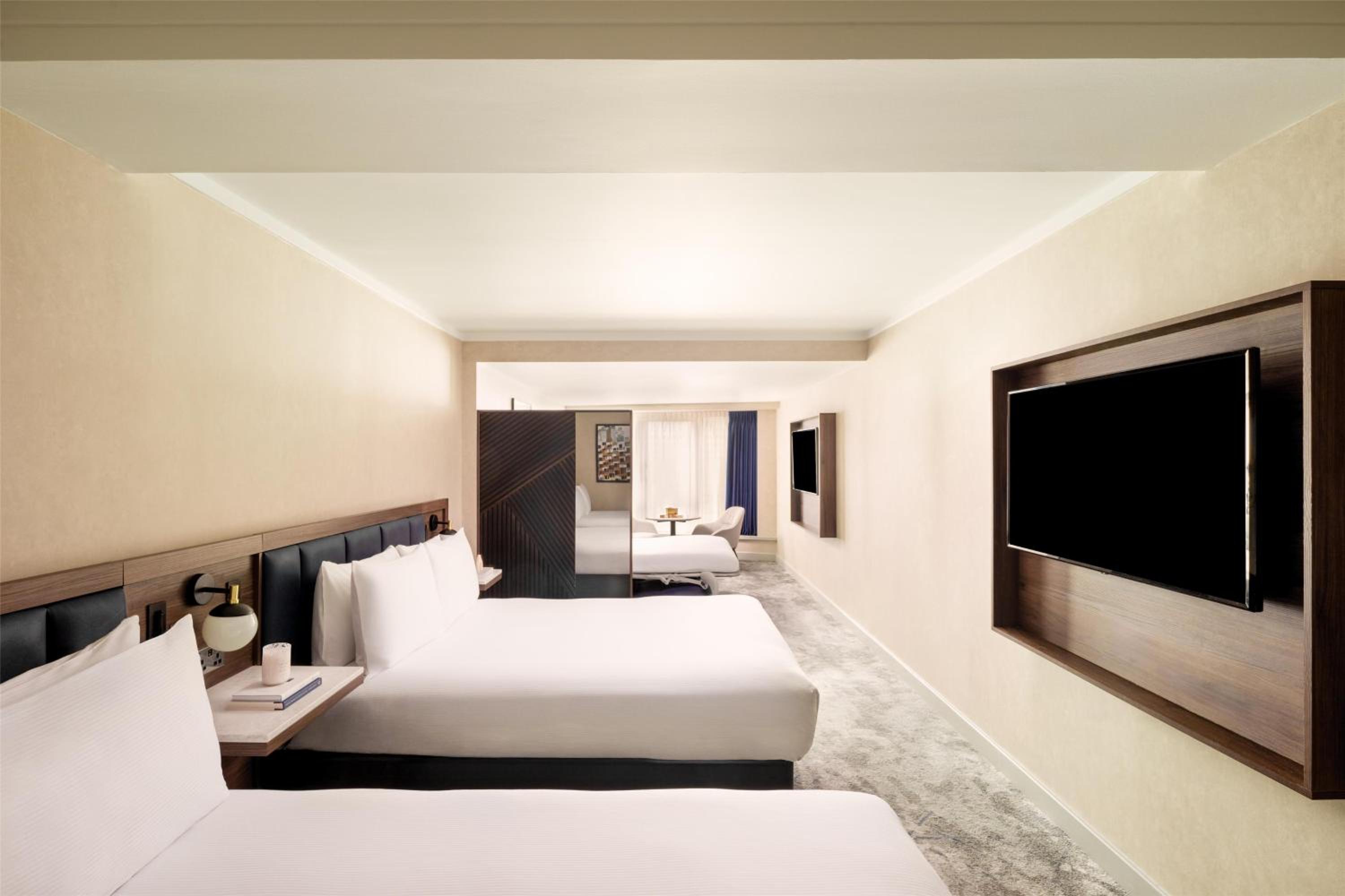 Family Room with Two Queen Beds and Sofa Bed