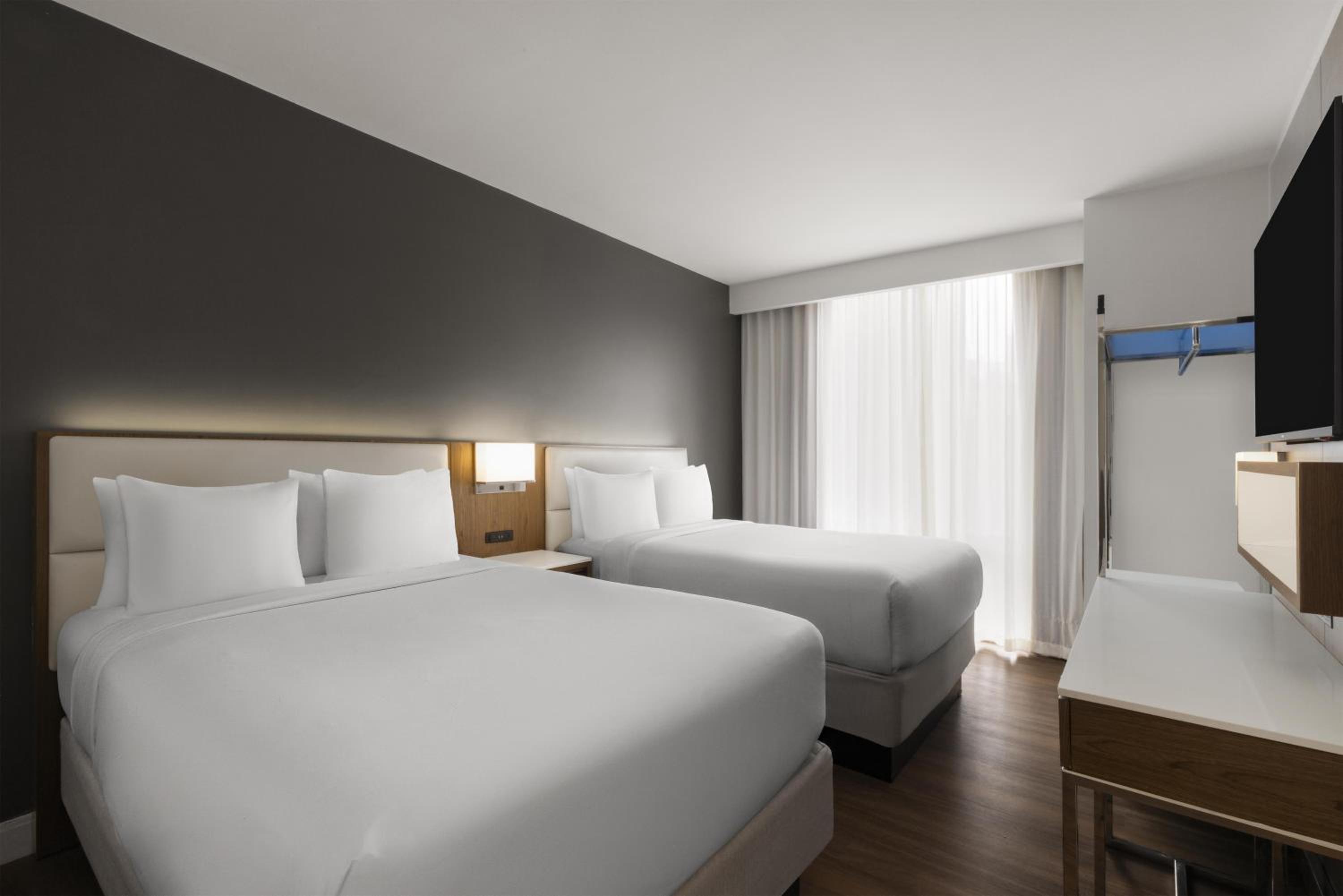 One-Bedroom Suite with Two Double Beds and Sofa Bed - Non-Smoking