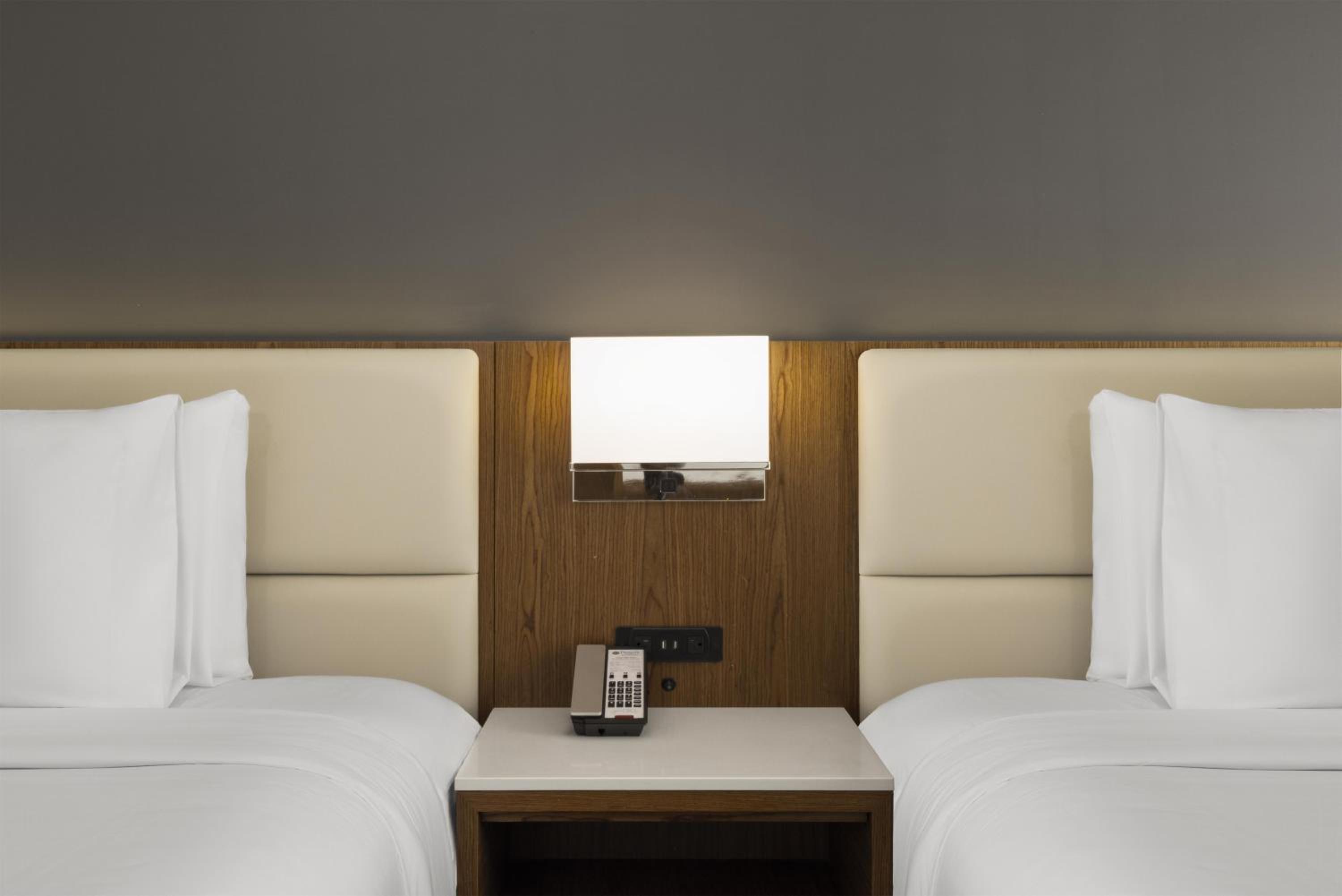 One-Bedroom Suite with Two Double Beds and Sofa Bed - Non-Smoking