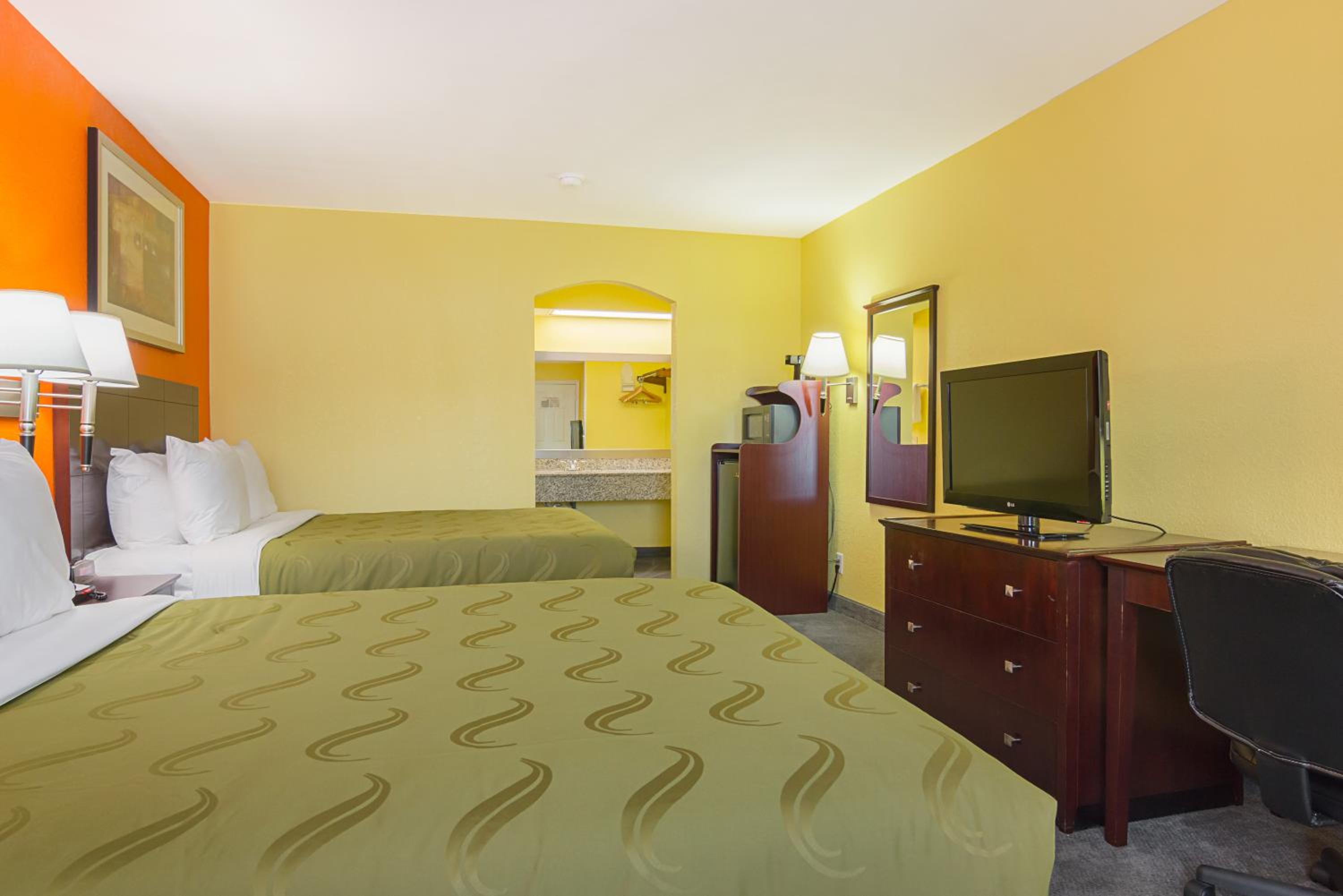 Queen Room with Two Queen Beds - Non-Smoking - Photo 1