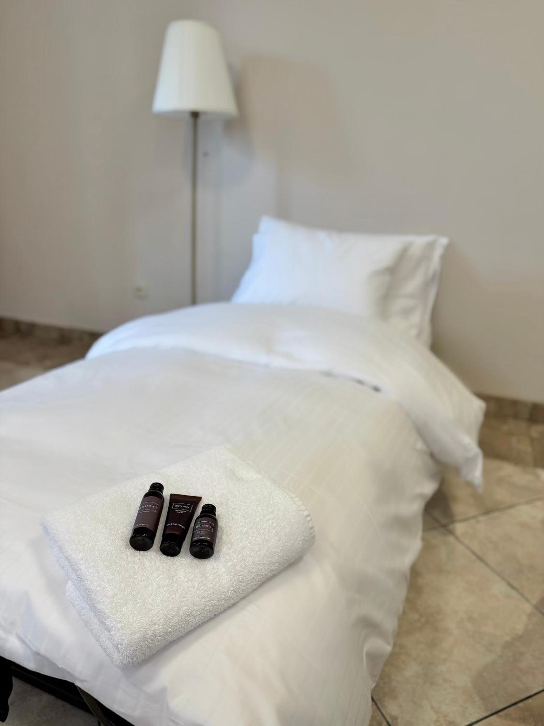 Single Bed in Dormitory Room