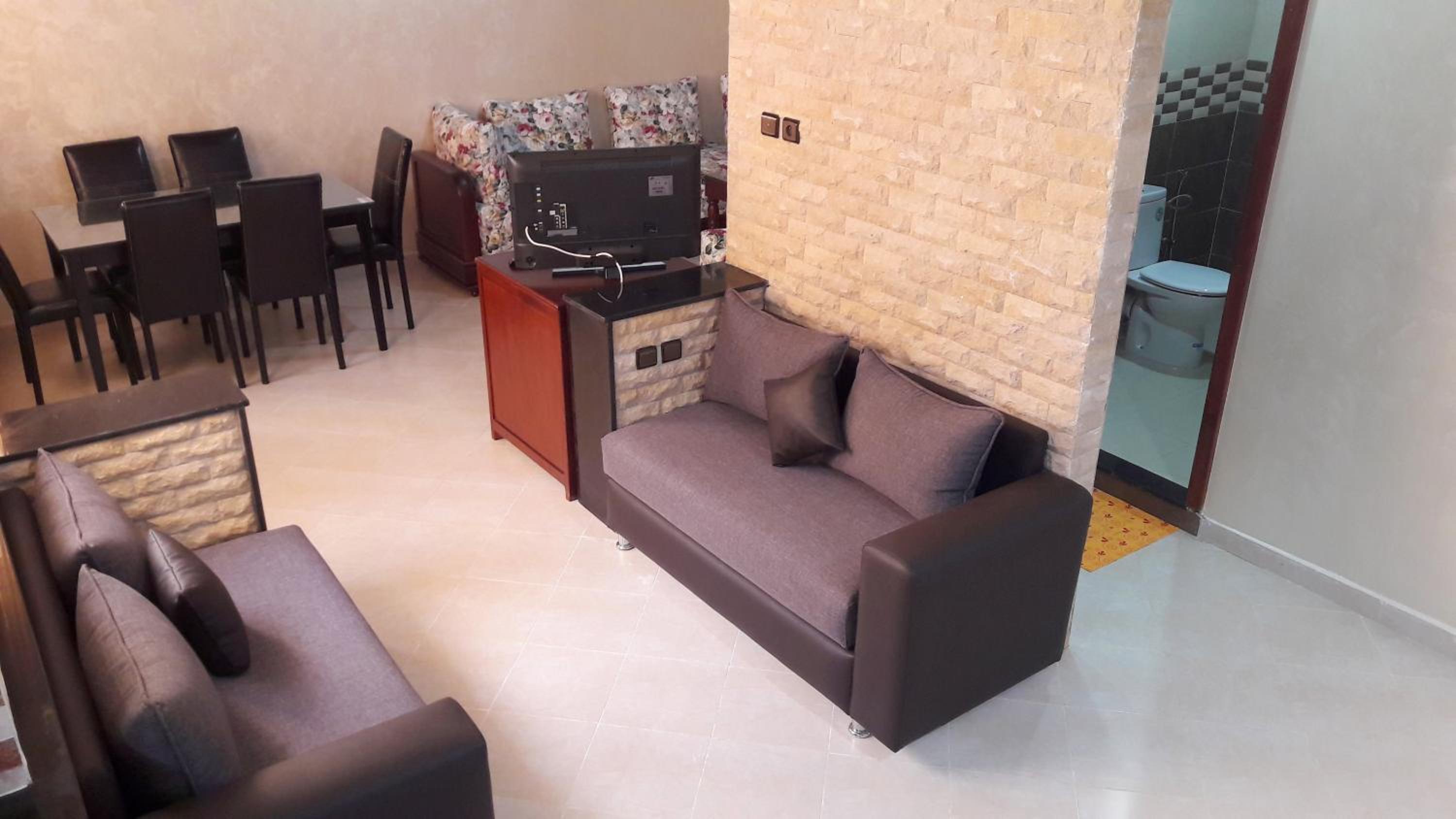 Three-Bedroom Apartment - Photo 40