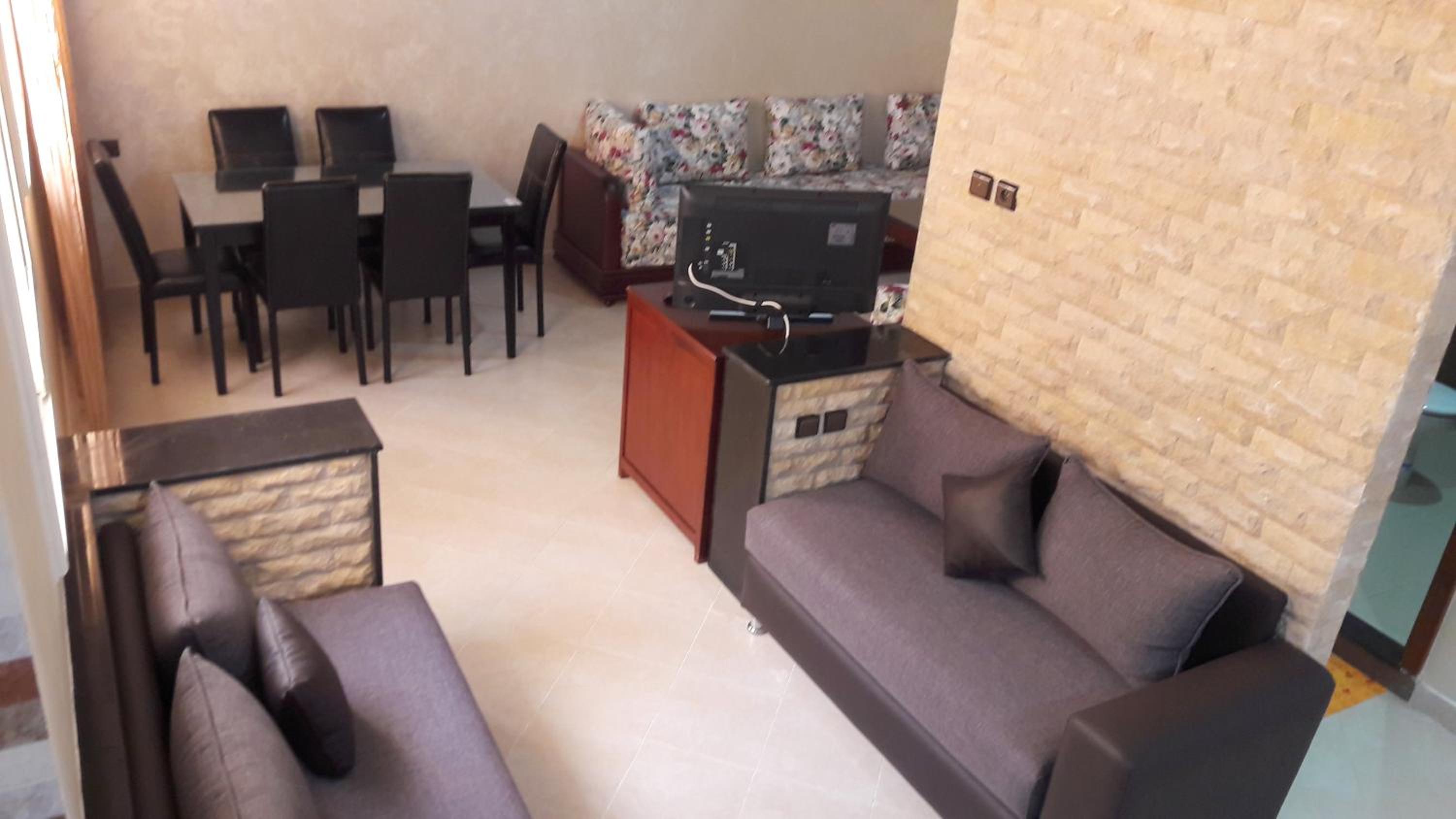 Three-Bedroom Apartment - Photo 1