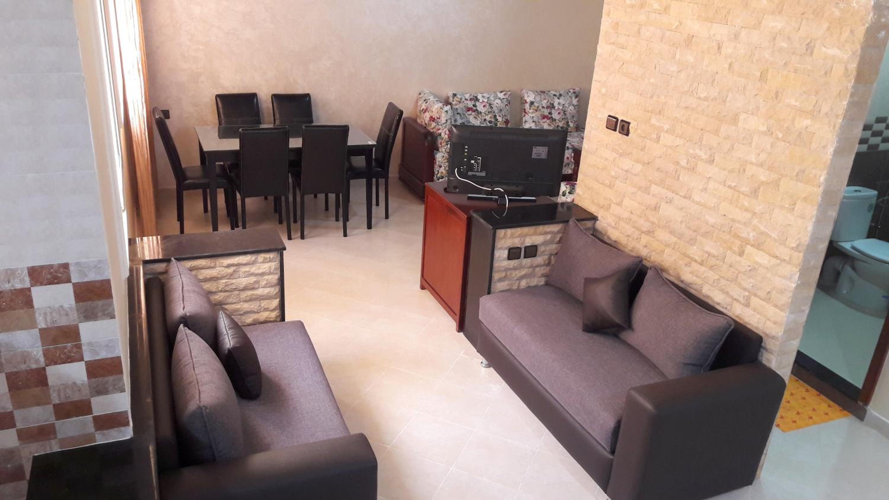 Three-Bedroom Apartment - Photo 7
