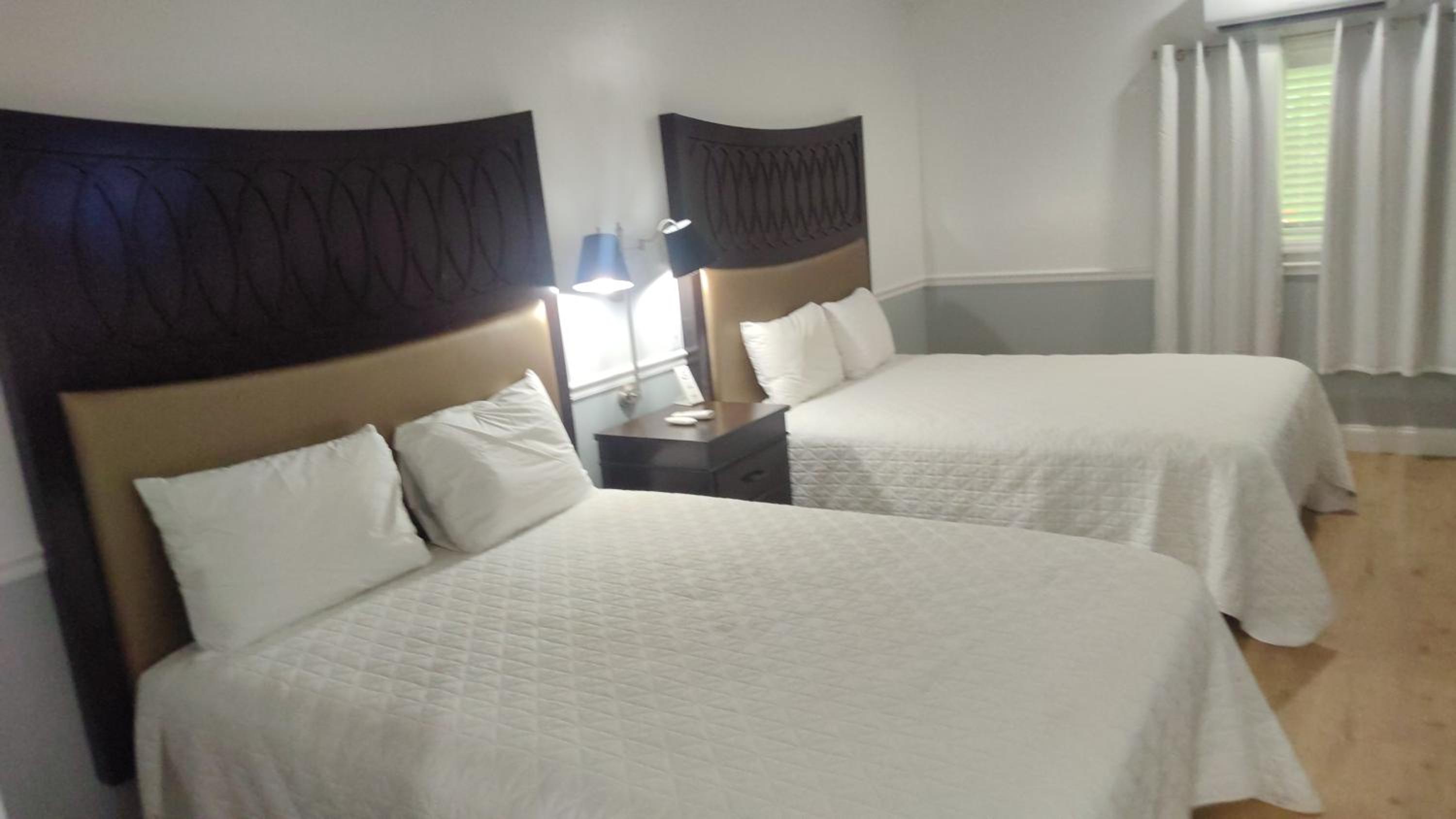 Deluxe Queen Room with Two Queen Beds photo 1