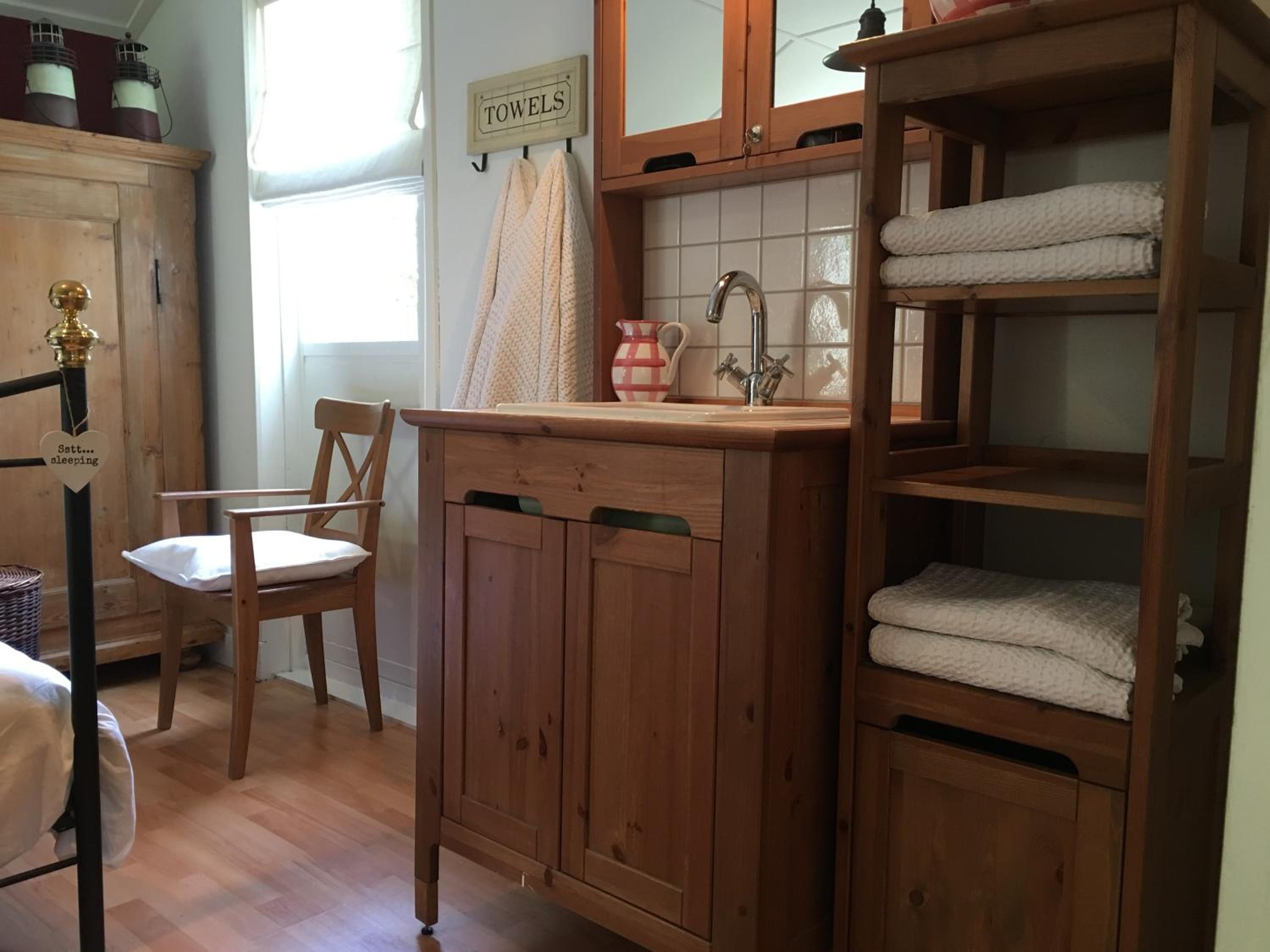 Three-Bedroom House - Photo 23