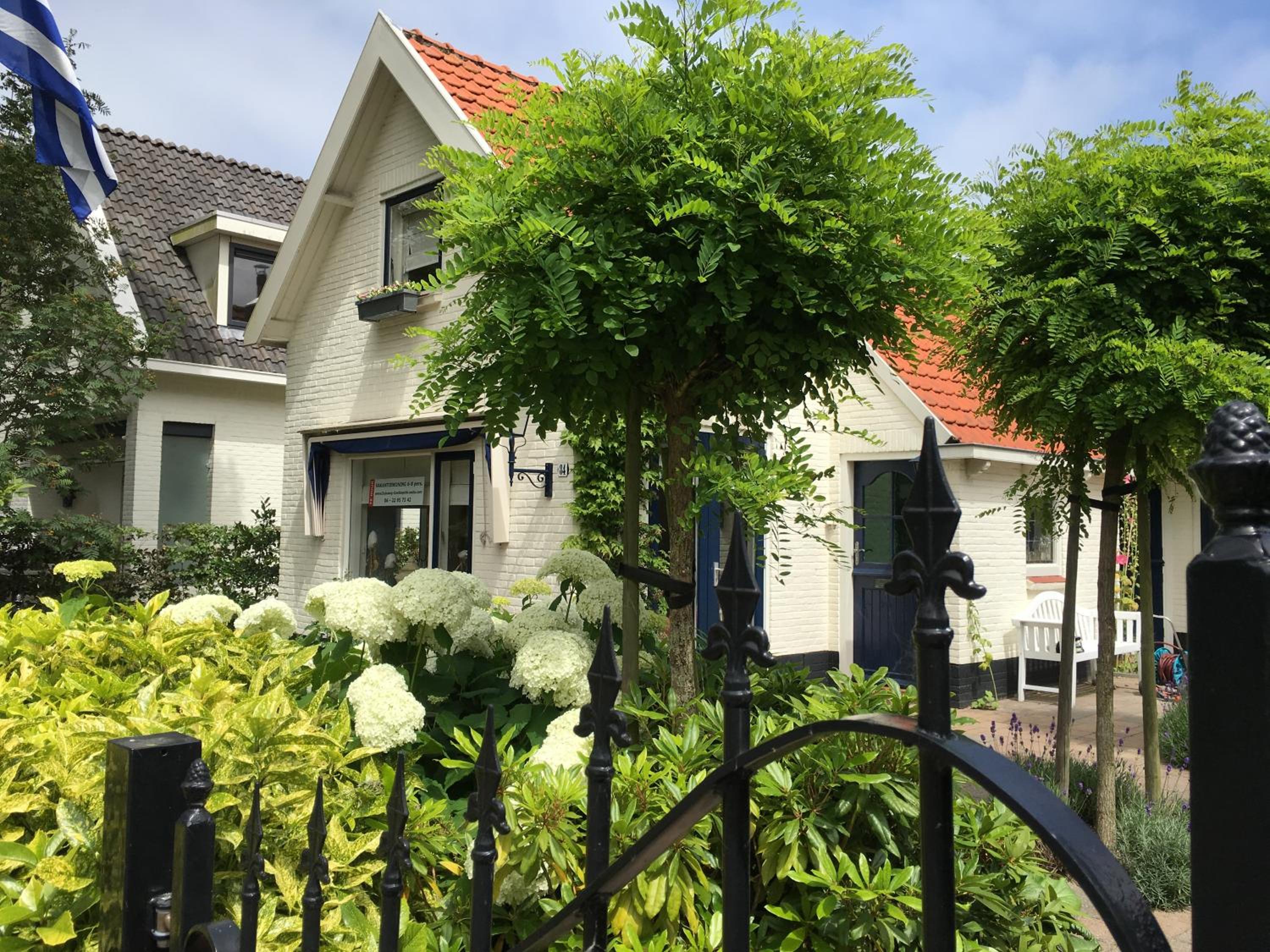 Three-Bedroom House - Photo 22